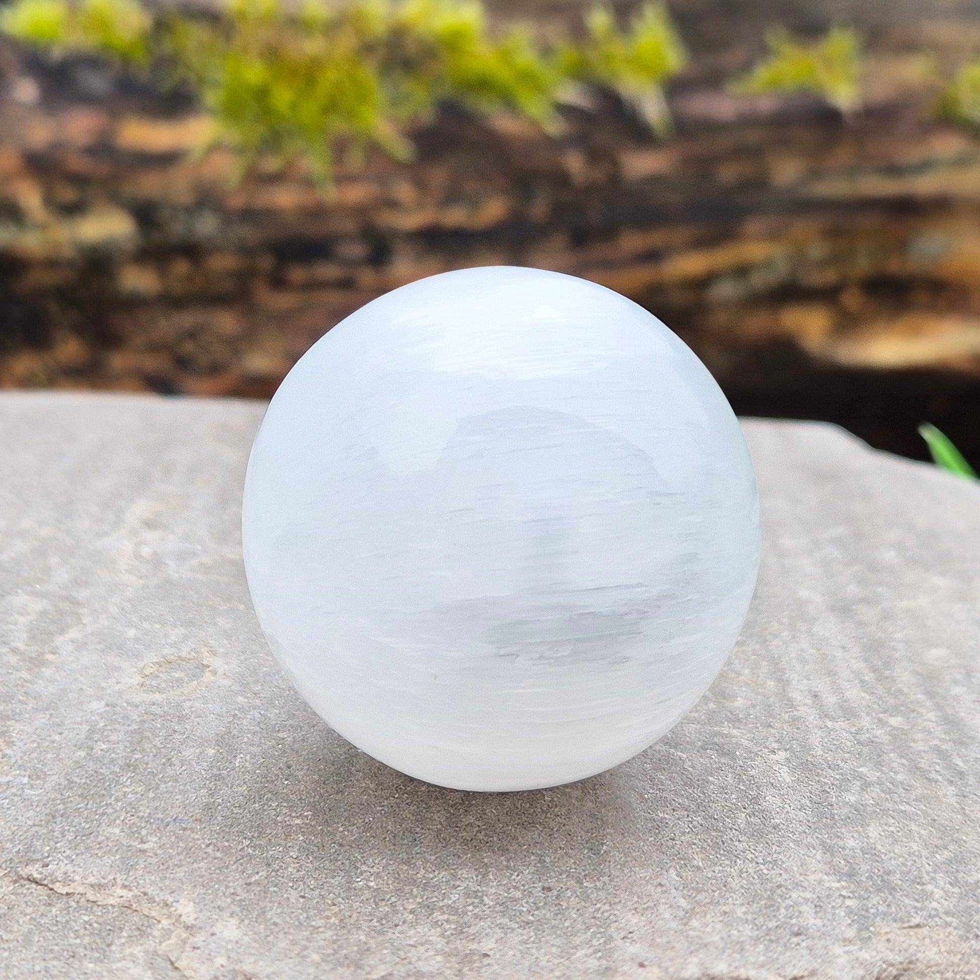Selenite crystal sphere that brings soft, cleansing energy and a calm atmosphere. Ideal for clearing spaces, uplifting energy and gentle display.
