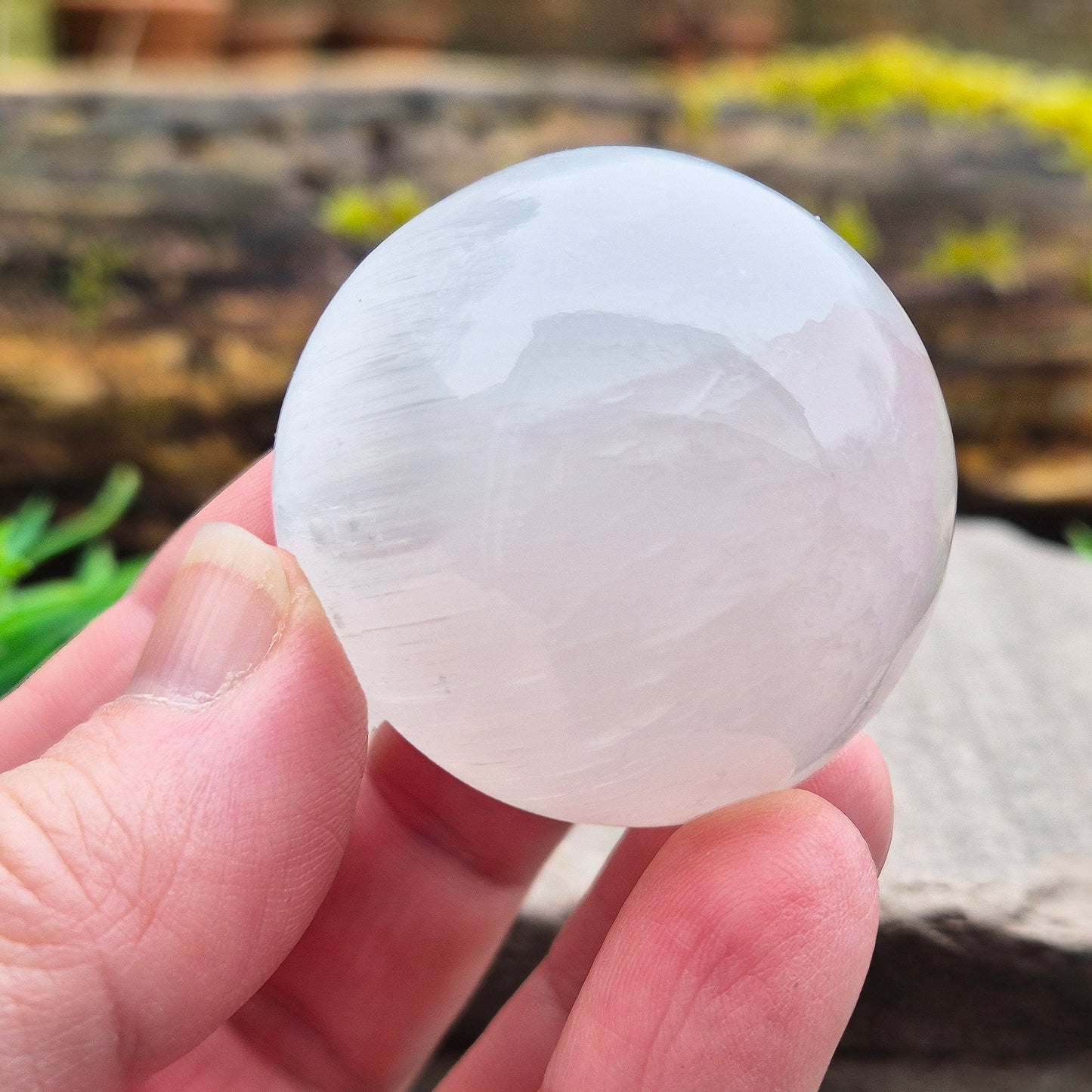 Selenite crystal sphere that brings soft, cleansing energy and a calm atmosphere. Ideal for clearing spaces, uplifting energy and gentle display.
