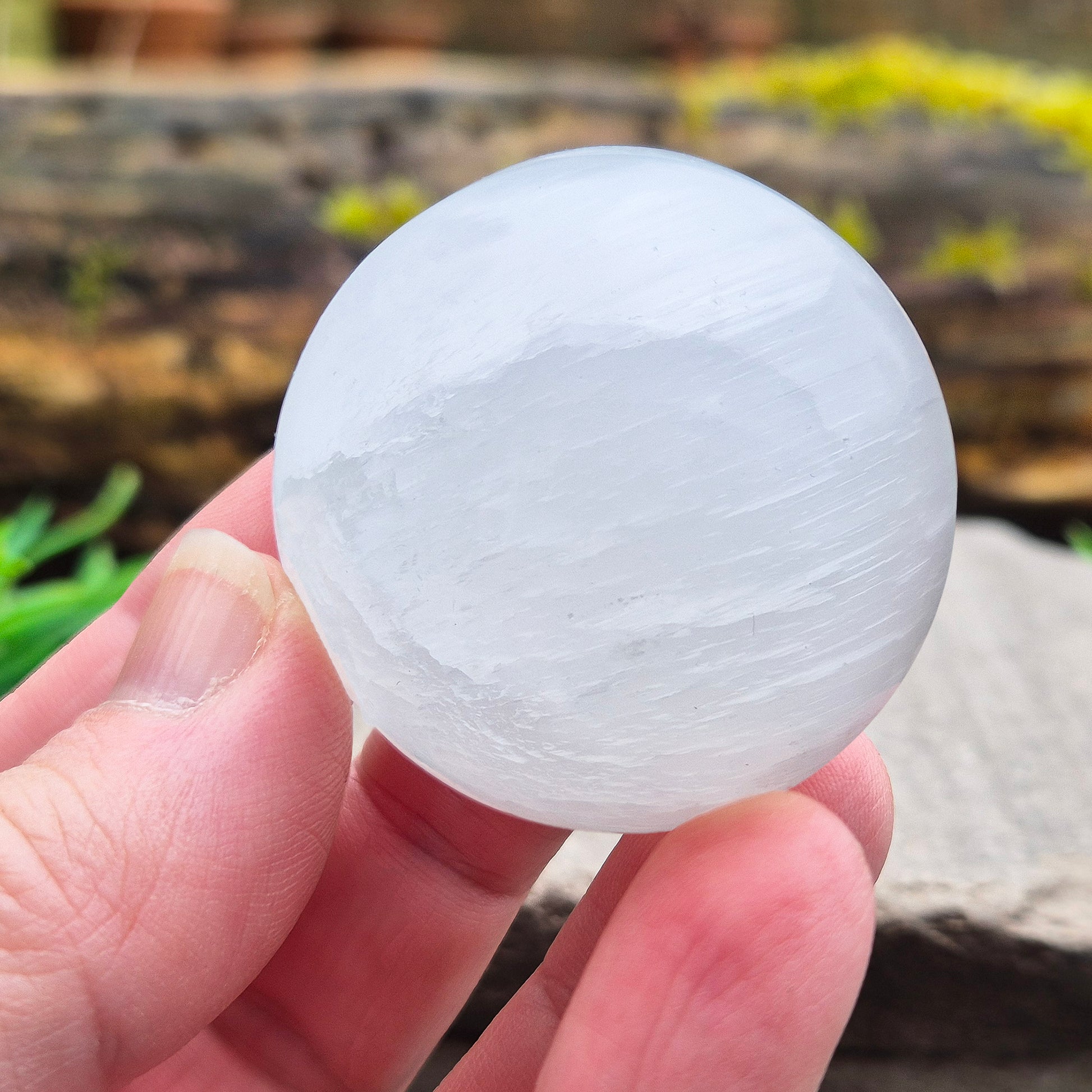 Selenite crystal sphere that brings soft, cleansing energy and a calm atmosphere. Ideal for clearing spaces, uplifting energy and gentle display.