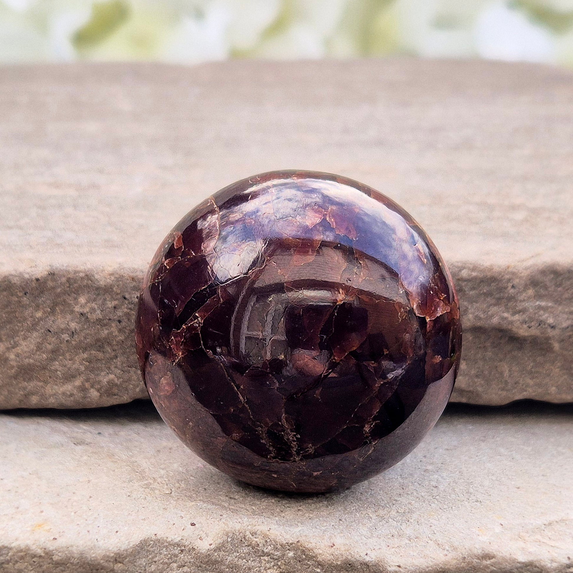 Natural Almandine-Pyrope Star Garnet palm stone. Sparkling, rare, and ideal for meditation, energy work, or display.
