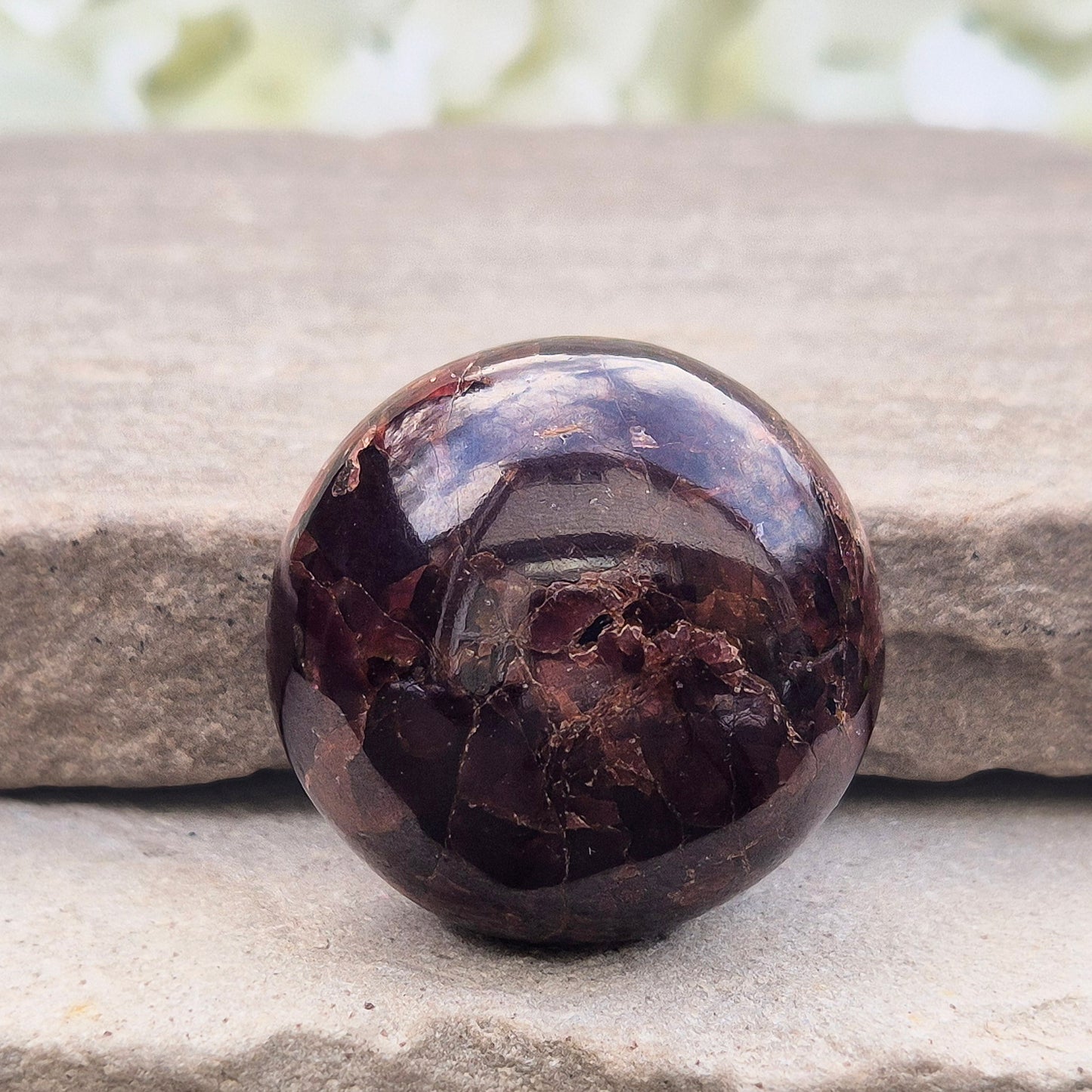 Natural Almandine-Pyrope Star Garnet palm stone. Sparkling, rare, and ideal for meditation, energy work, or display.