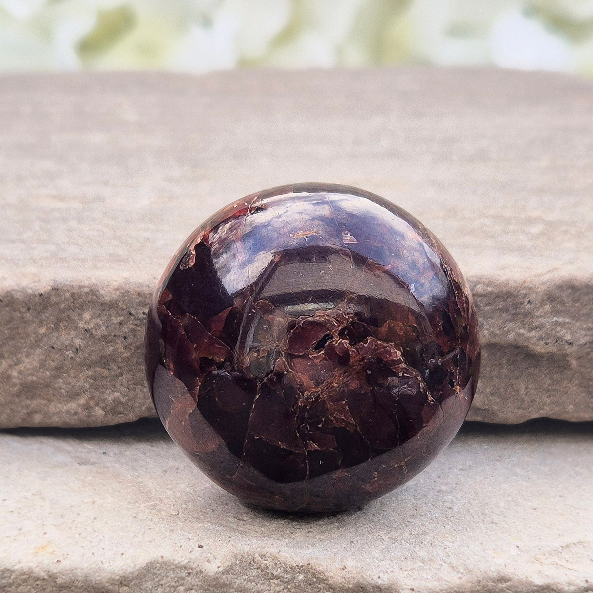 Natural Almandine-Pyrope Star Garnet palm stone. Sparkling, rare, and ideal for meditation, energy work, or display.