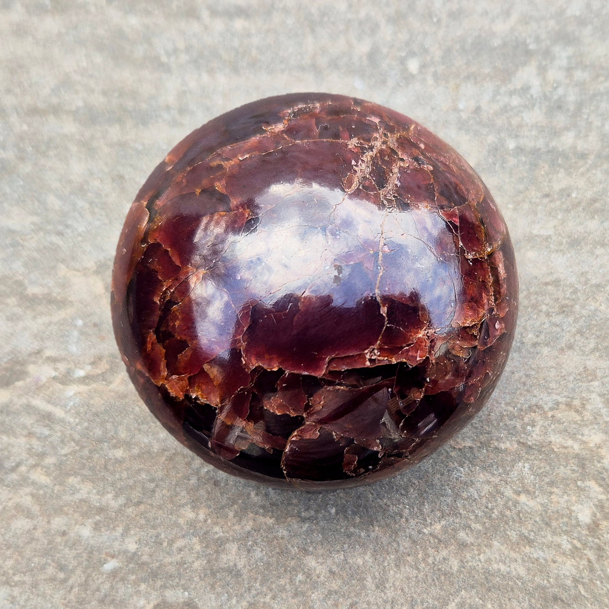 Natural Almandine-Pyrope Star Garnet palm stone. Sparkling, rare, and ideal for meditation, energy work, or display.