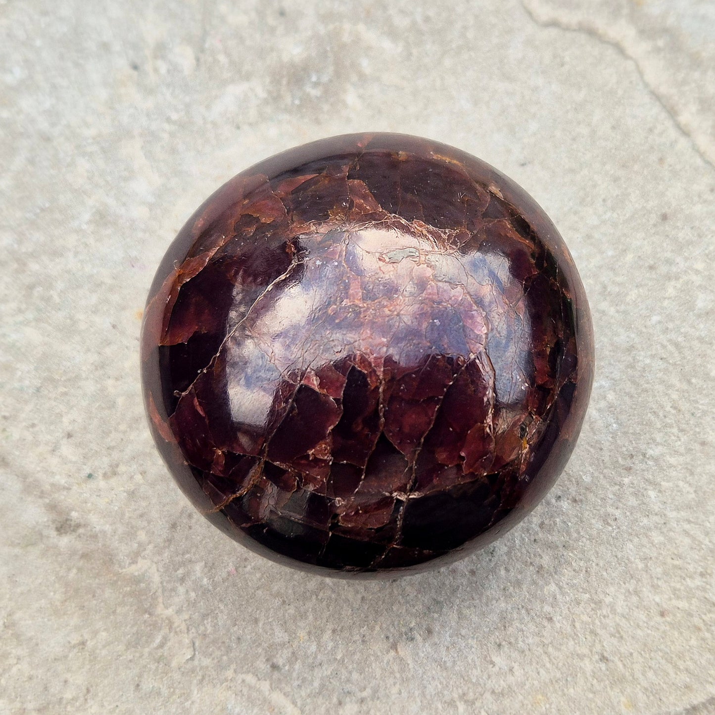 Natural Almandine-Pyrope Star Garnet palm stone. Sparkling, rare, and ideal for meditation, energy work, or display.