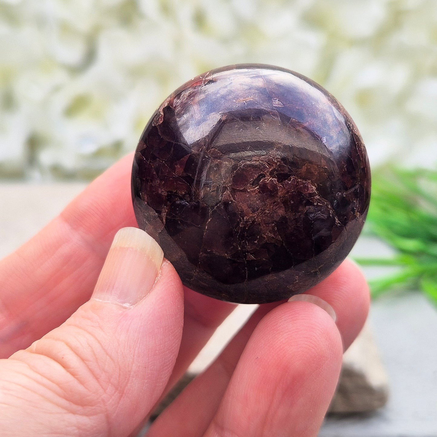 Natural Almandine-Pyrope Star Garnet palm stone. Sparkling, rare, and ideal for meditation, energy work, or display.