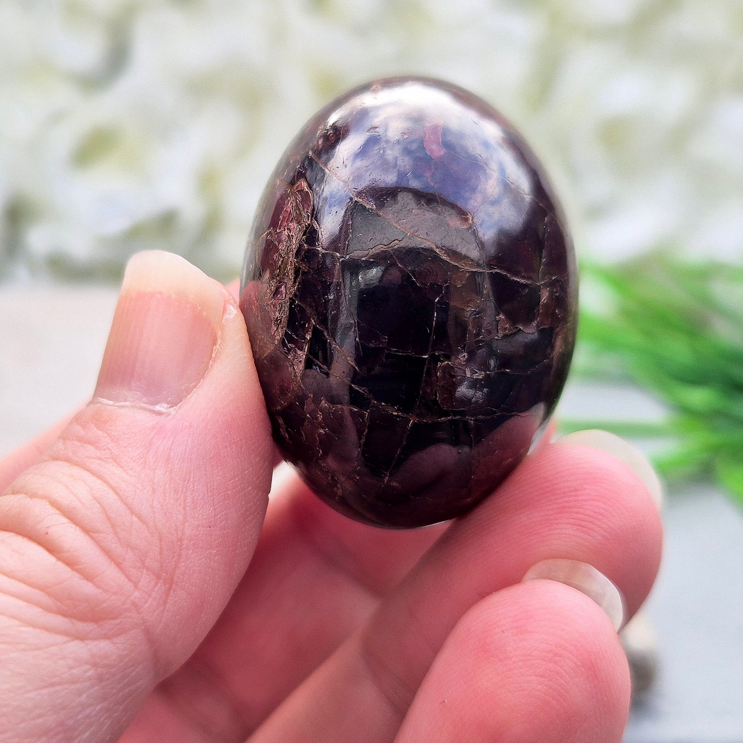 Natural Almandine-Pyrope Star Garnet palm stone. Sparkling, rare, and ideal for meditation, energy work, or display.