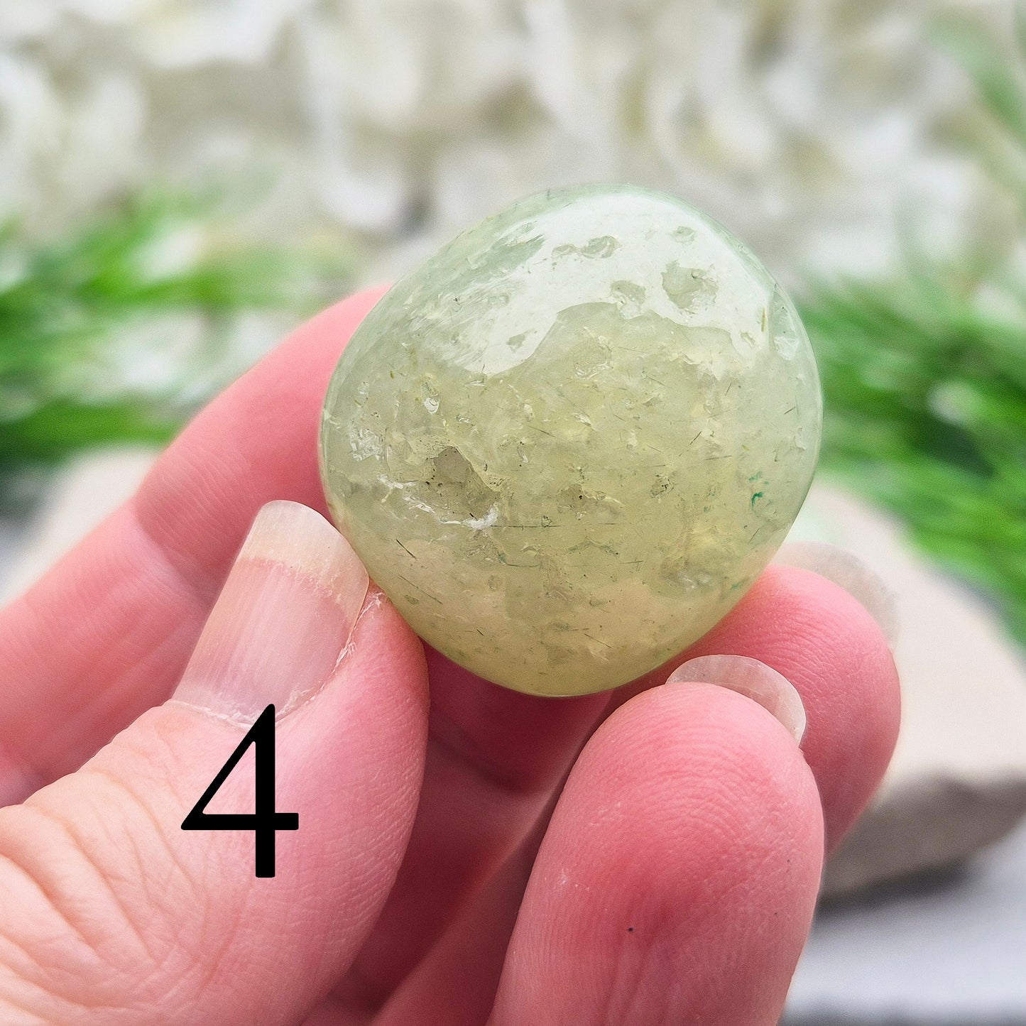 light green Prehnite XL tumblestone from Mali. Soft, calming crystal with gentle energy. Ideal for emotional balance, self-trust, and peaceful spaces.
