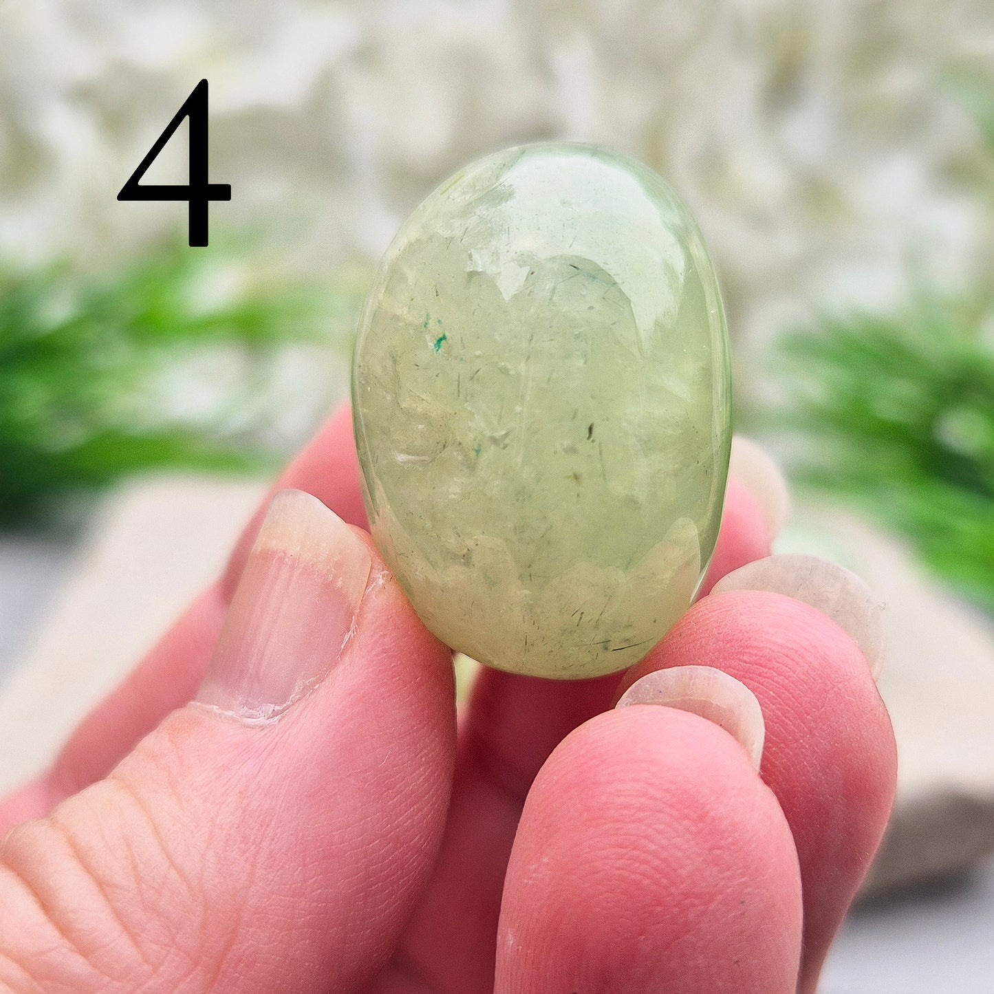 light green Prehnite XL tumblestone from Mali. Soft, calming crystal with gentle energy. Ideal for emotional balance, self-trust, and peaceful spaces.