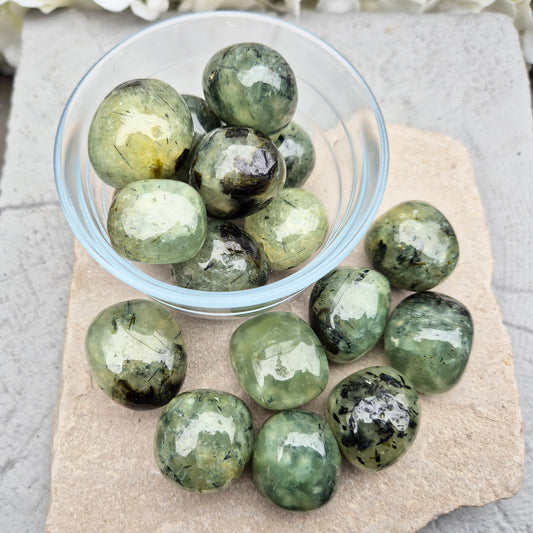 XL Prehnite with Epidote tumblestone, Mali origin. Deep green crystal with natural inclusions, ideal for emotional balance, motivation, and energy flow.