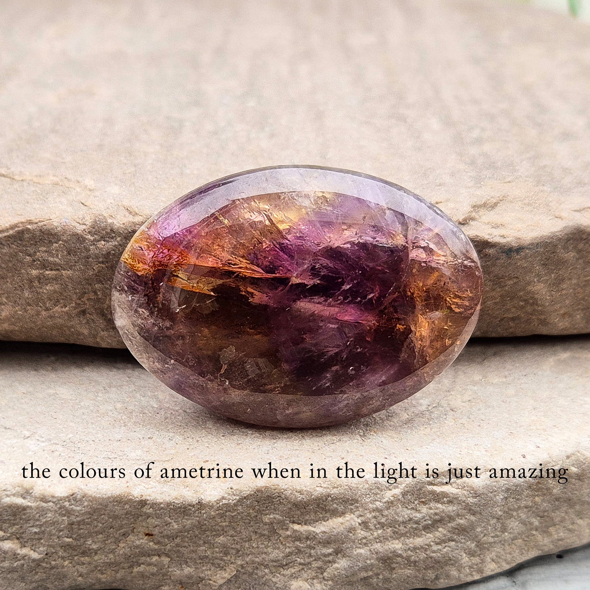Natural Ametrine palm stone with subtle colour mix and organic inclusions. A smooth, easy-to-hold crystal for focus, balance, and direction.