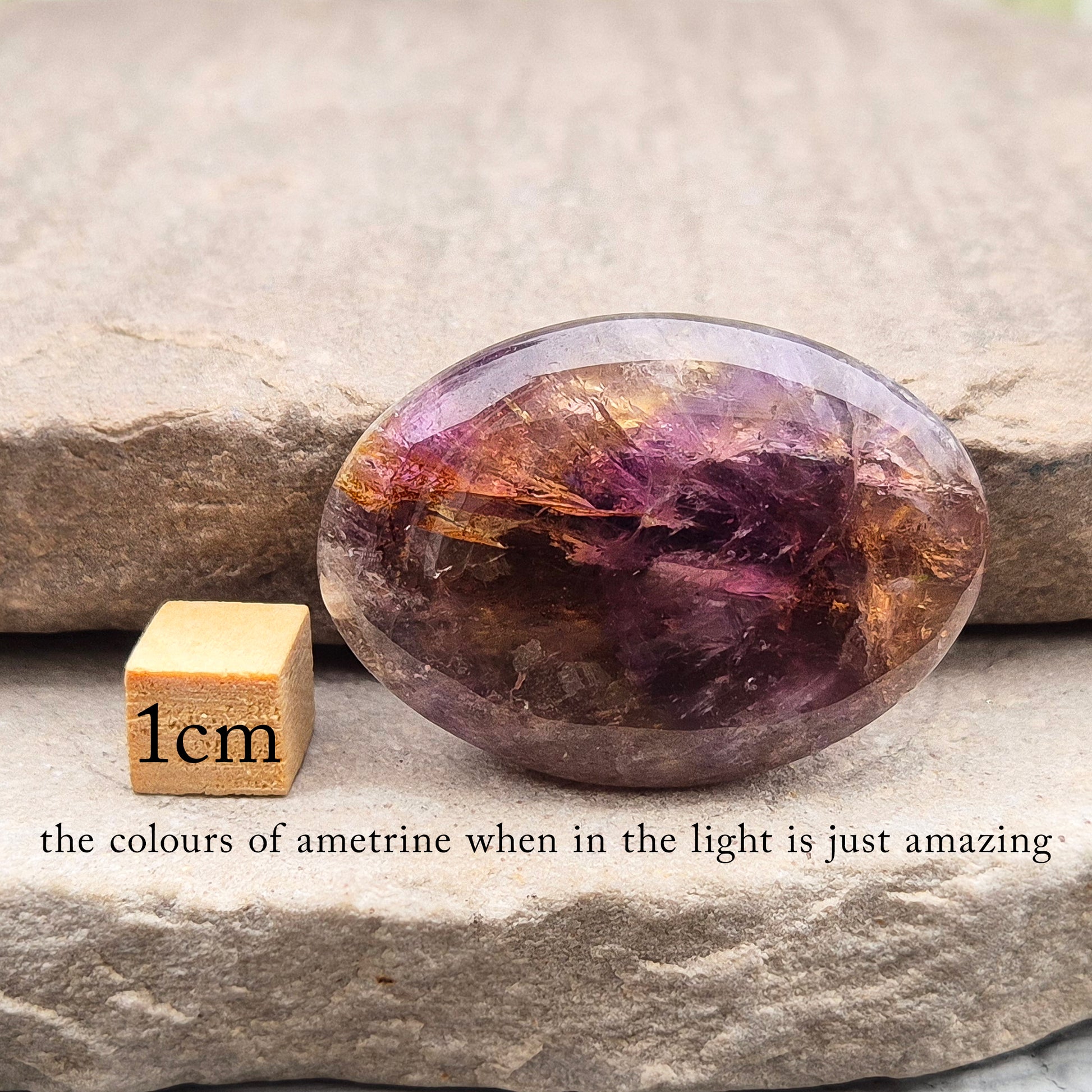 Natural Ametrine palm stone with subtle colour mix and organic inclusions. A smooth, easy-to-hold crystal for focus, balance, and direction.