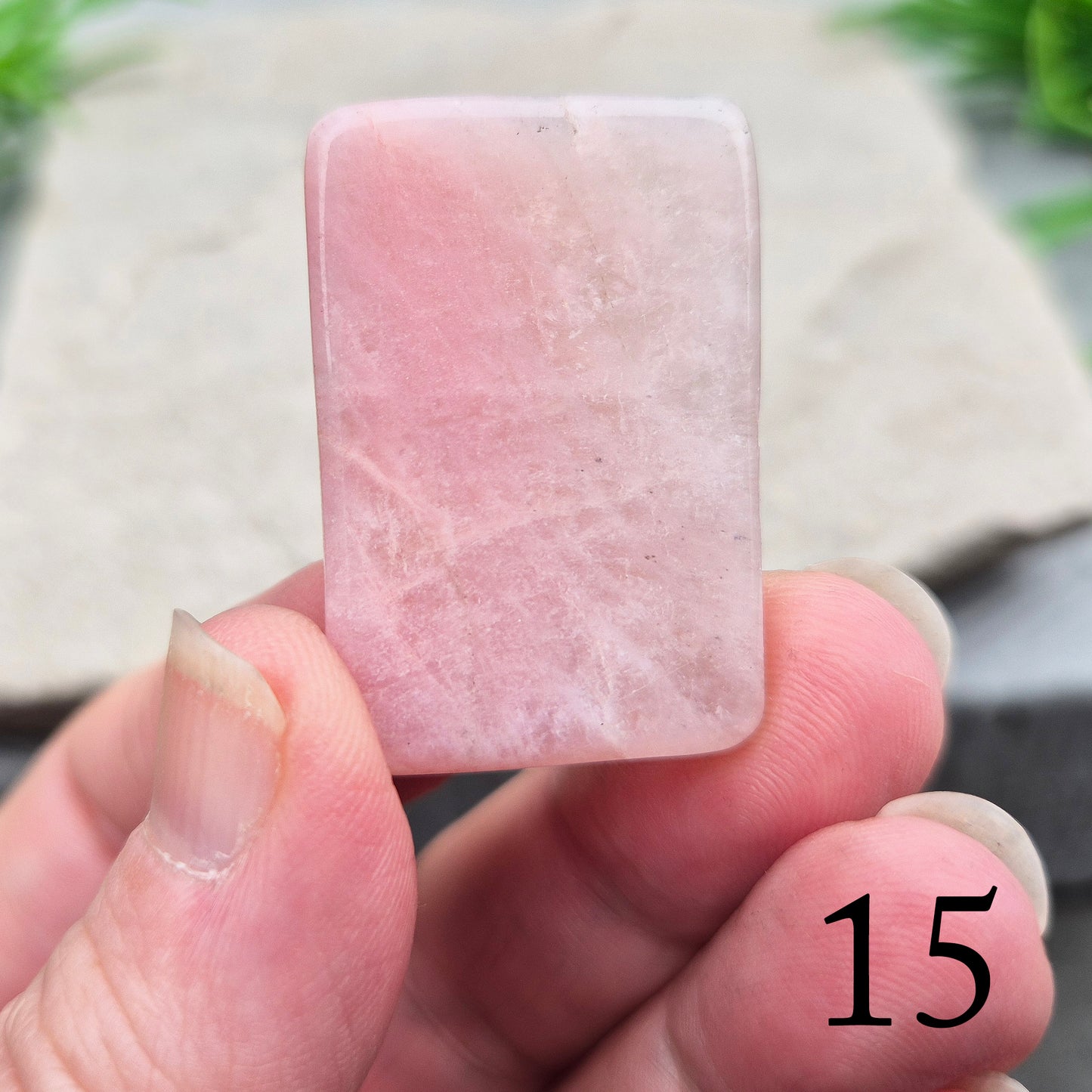Pink Petalite polished slice with soft pale pink tones. Ideal for jewellery making, crystal grids, or carrying as a small calming stone.