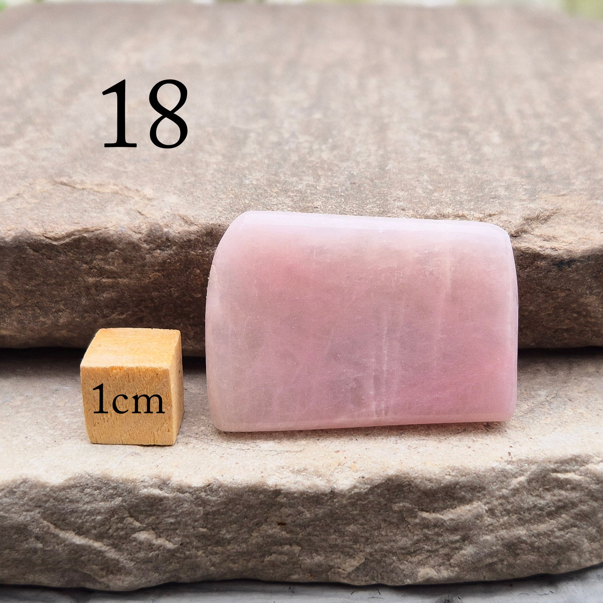 Pink Petalite polished slice with soft pale pink tones. Ideal for jewellery making, crystal grids, or carrying as a small calming stone.