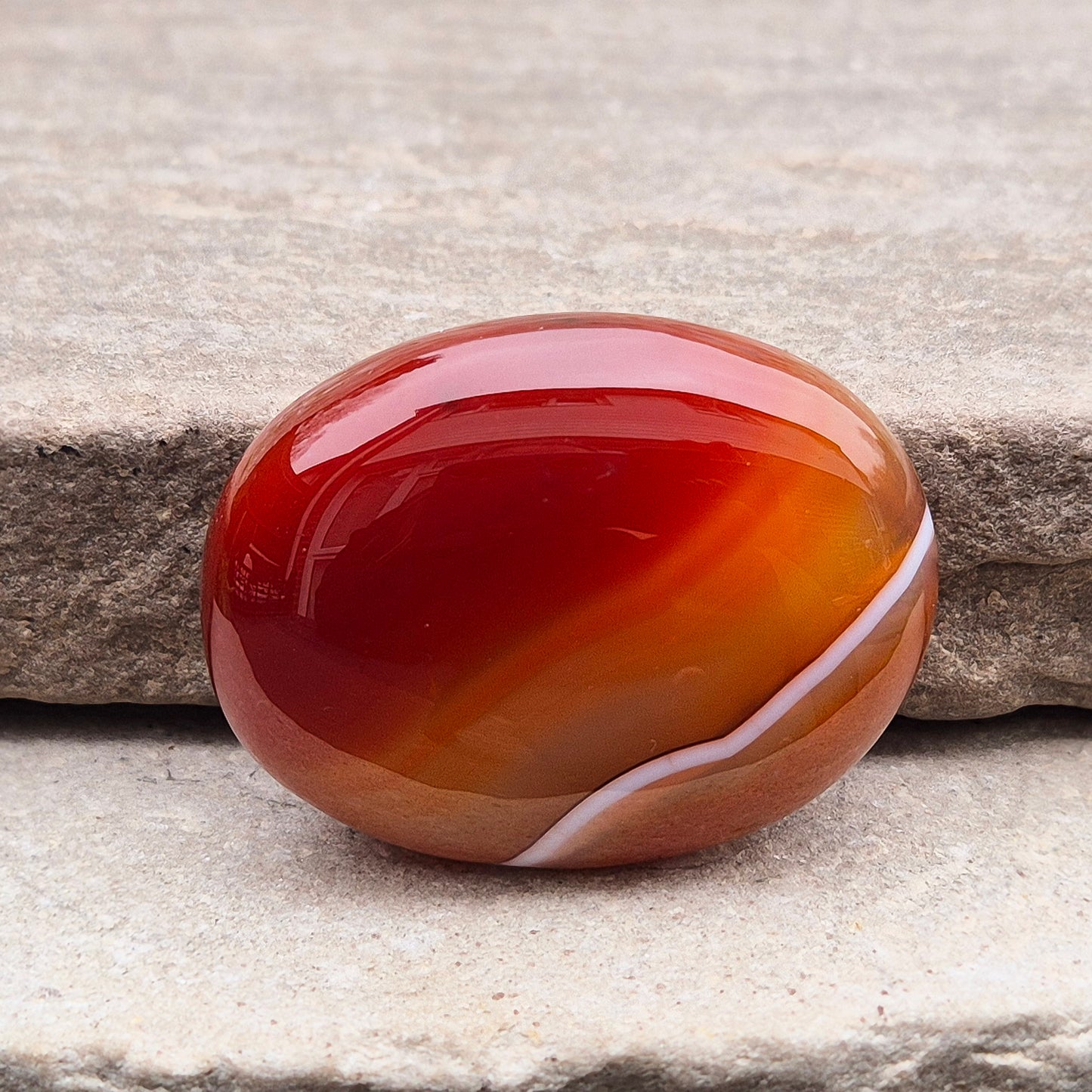 Banded Carnelian palm stone from Madagascar. Boosts motivation, confidence and creativity. Grounding Root and Sacral crystal for energy and focus. 