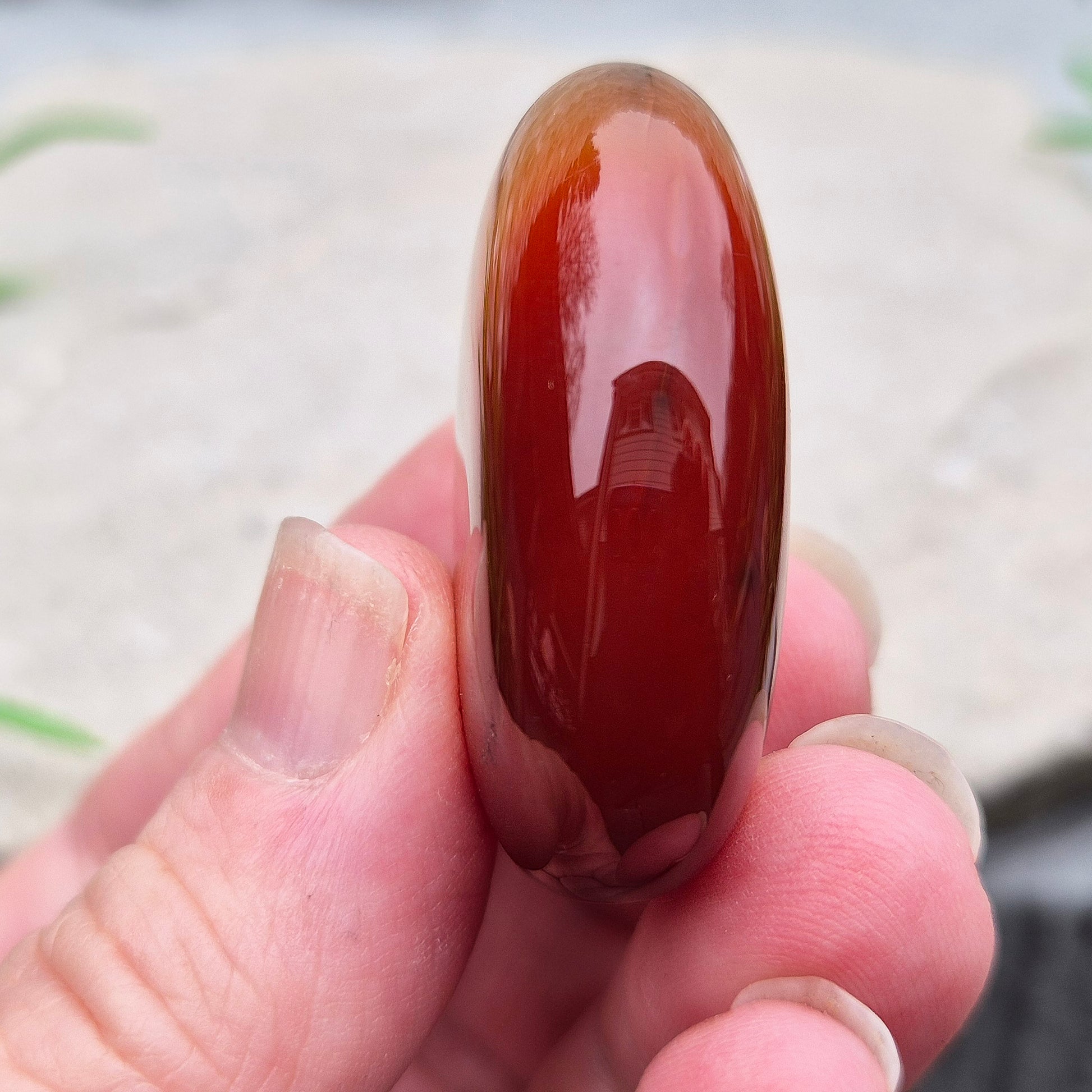 Banded Carnelian palm stone from Madagascar. Boosts motivation, confidence and creativity. Grounding Root and Sacral crystal for energy and focus. 