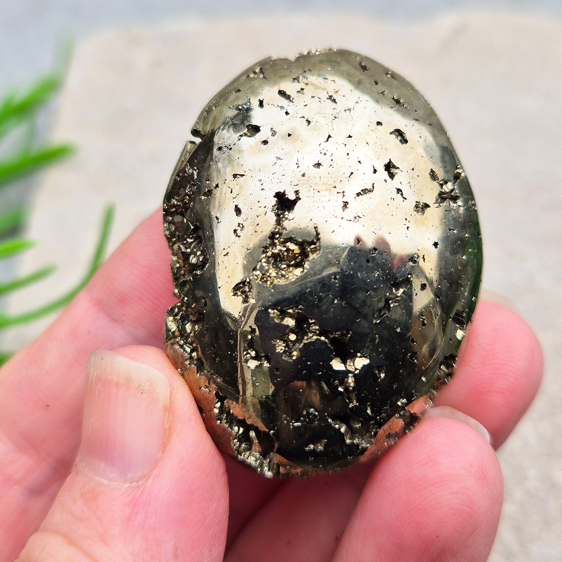 Pyrite palm stone with natural metallic shine, perfect for boosting confidence, focus, and motivation. A solid, grounding piece to keep close for daily energy support.