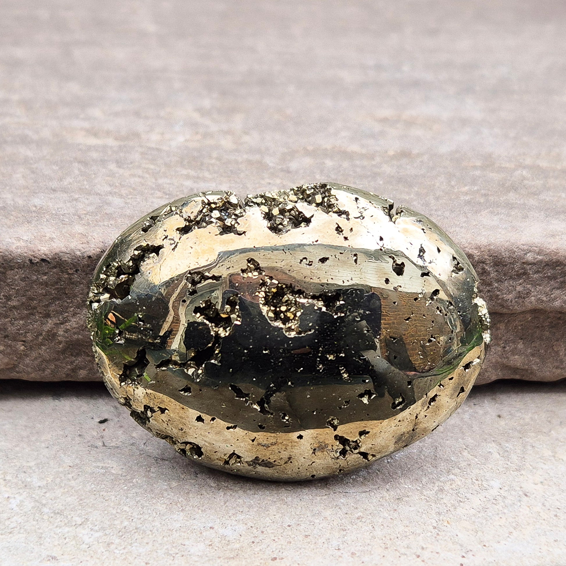 Pyrite palm stone with natural metallic shine, perfect for boosting confidence, focus, and motivation. A solid, grounding piece to keep close for daily energy support.
