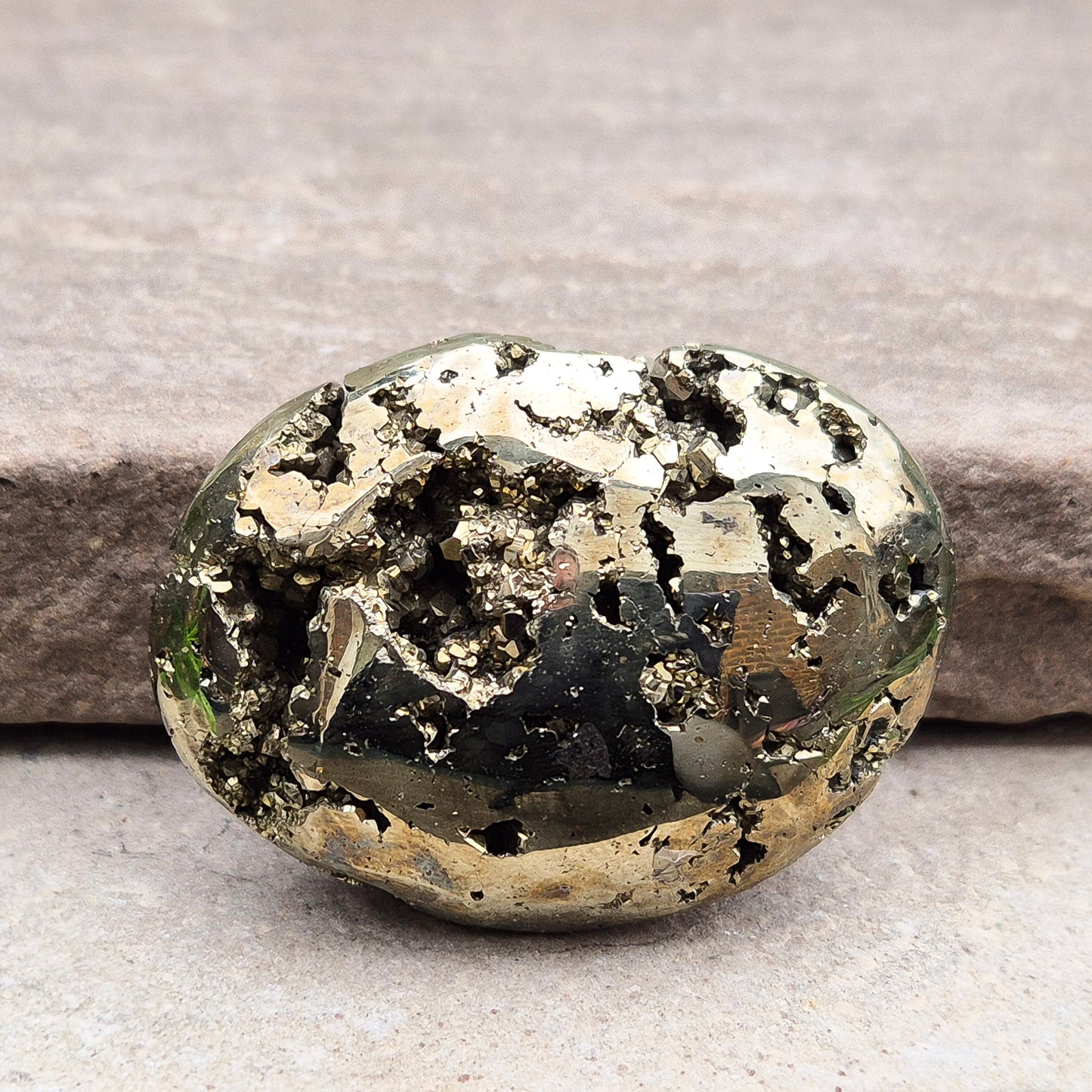 Pyrite palm stone with natural metallic shine, perfect for boosting confidence, focus, and motivation. A solid, grounding piece to keep close for daily energy support.
