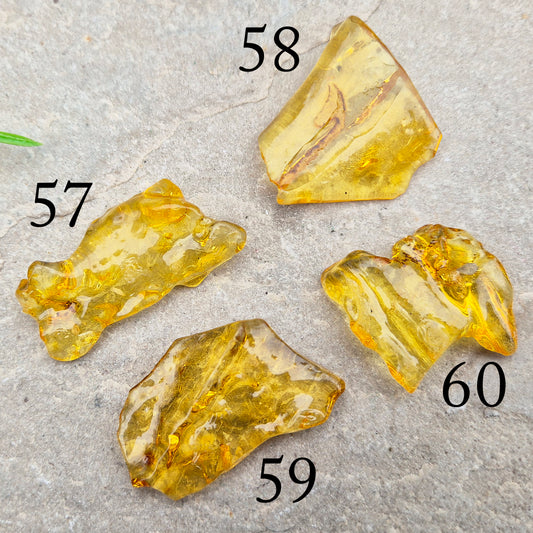 Colombian Copal Amber. Copal is younger than traditional Baltic Amber, which gives it a brighter, more sunlit appearance and a lighter energetic feel in the hand.