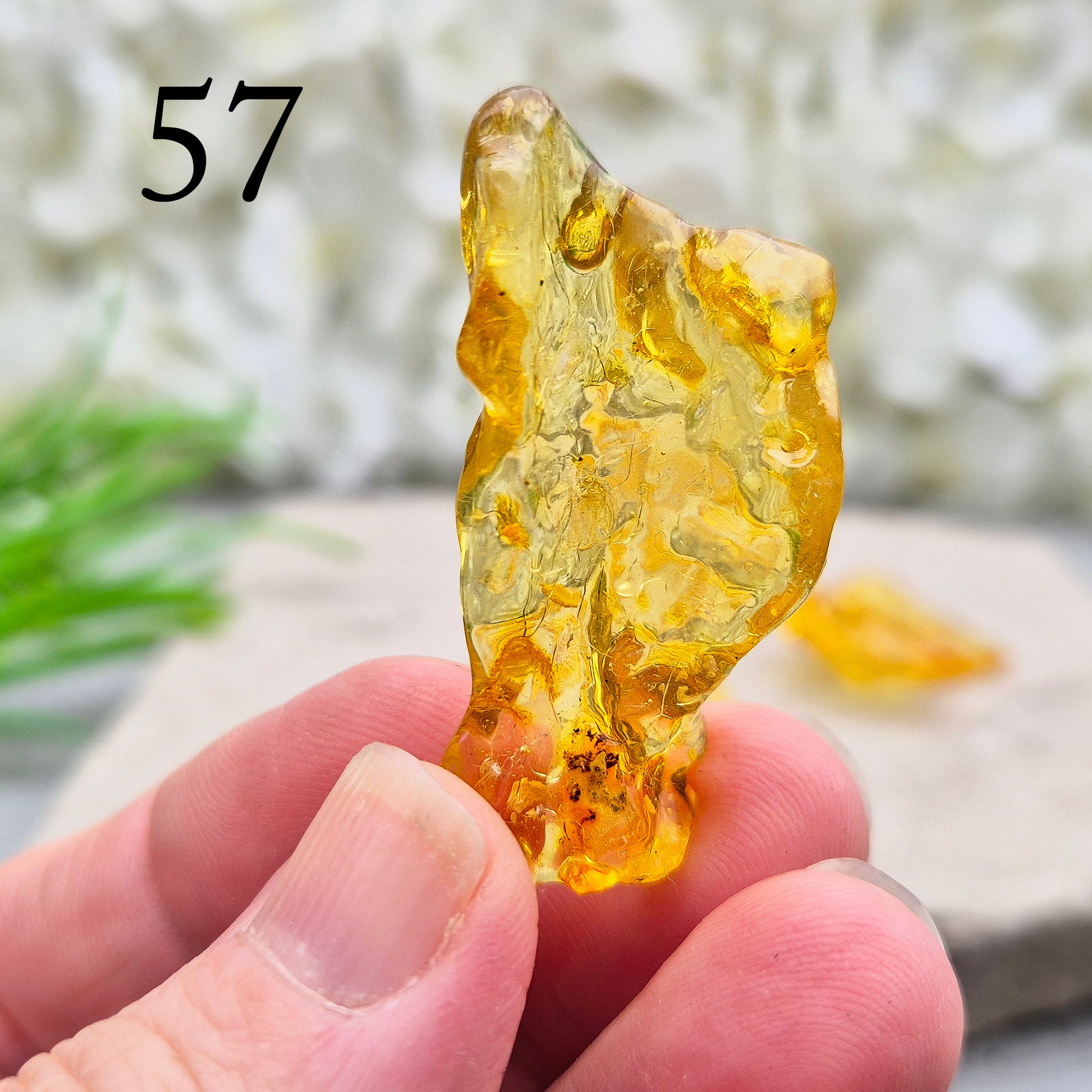 Colombian Copal Amber. Copal is younger than traditional Baltic Amber, which gives it a brighter, more sunlit appearance and a lighter energetic feel in the hand.
