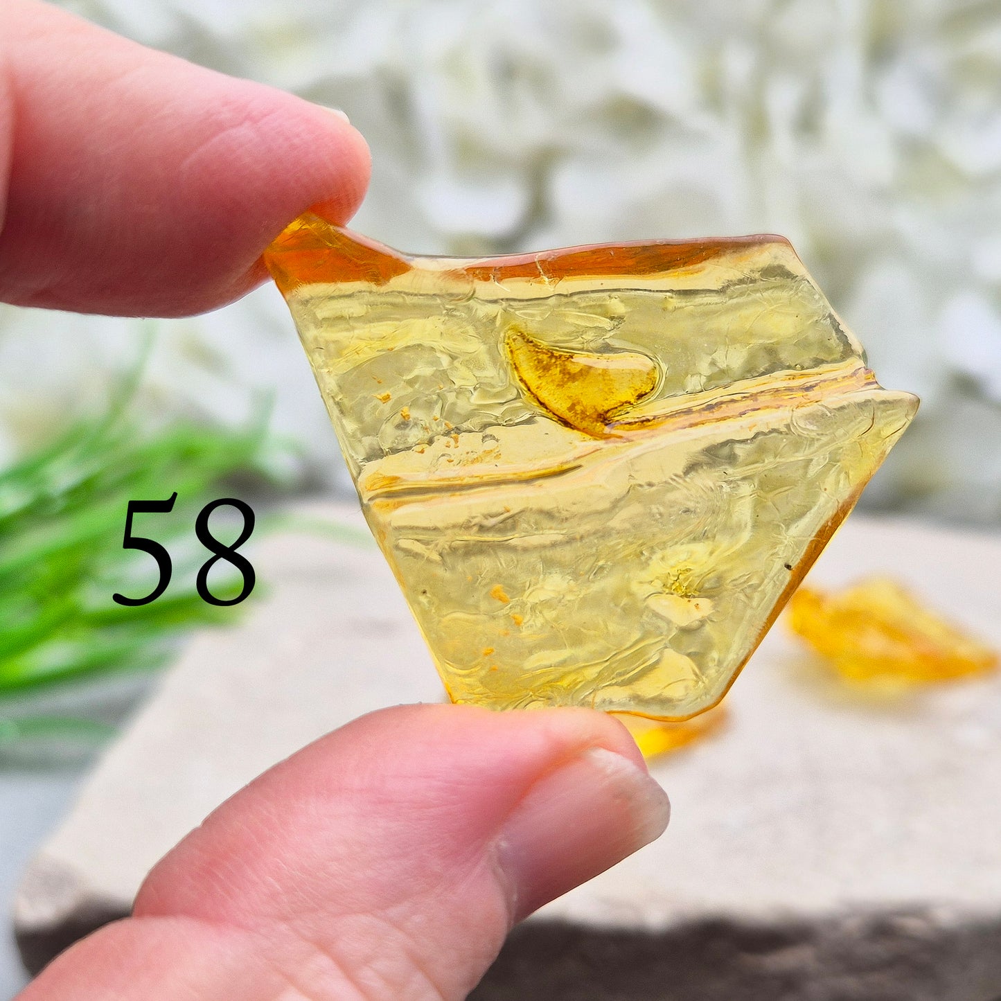 Colombian Copal Amber. Copal is younger than traditional Baltic Amber, which gives it a brighter, more sunlit appearance and a lighter energetic feel in the hand.