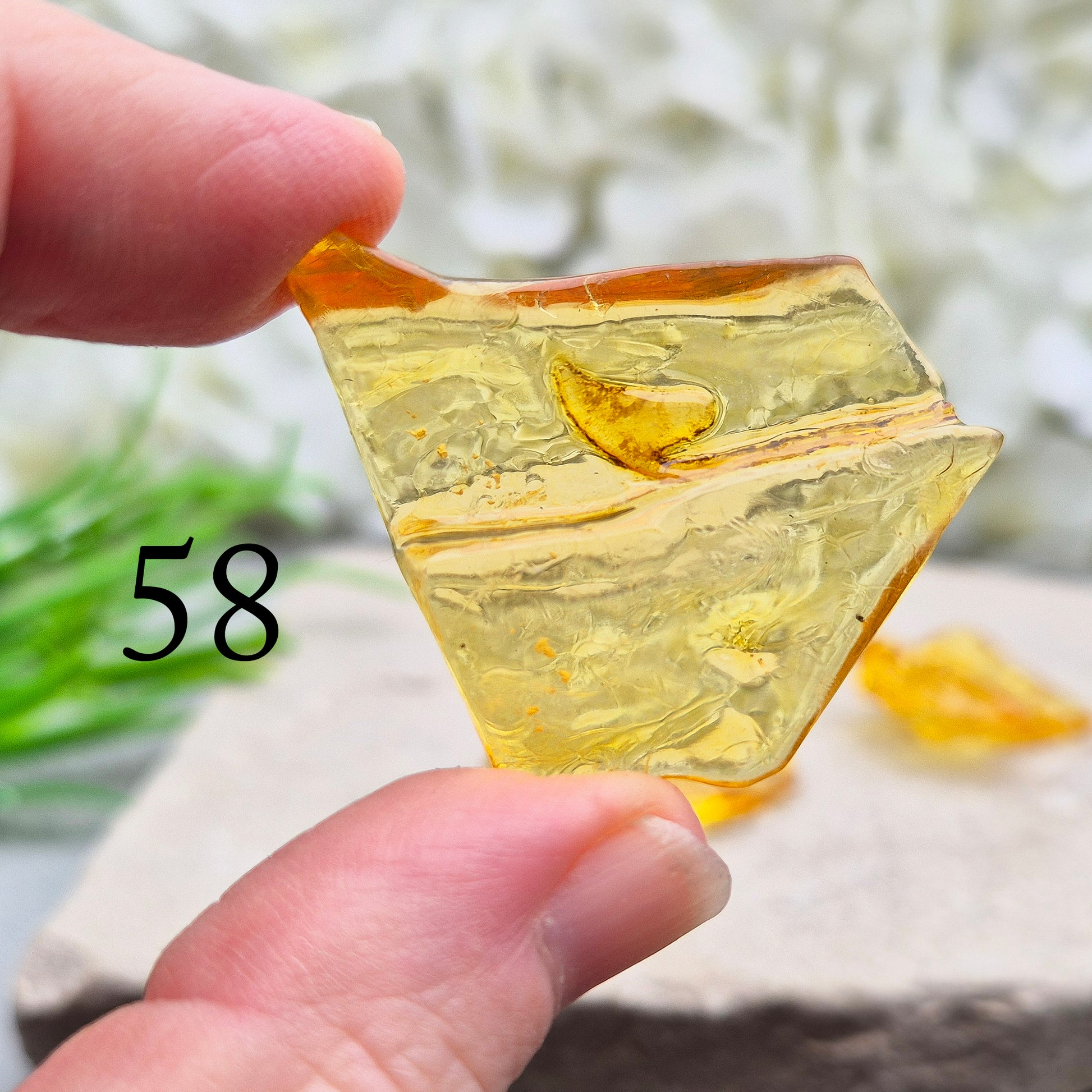 Colombian Copal Amber. Copal is younger than traditional Baltic Amber, which gives it a brighter, more sunlit appearance and a lighter energetic feel in the hand.