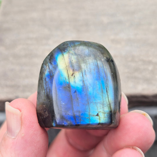 Labradorite Crystal Freeform. When the light hits it at just the right angle, flashes of yellow, and blue appear.