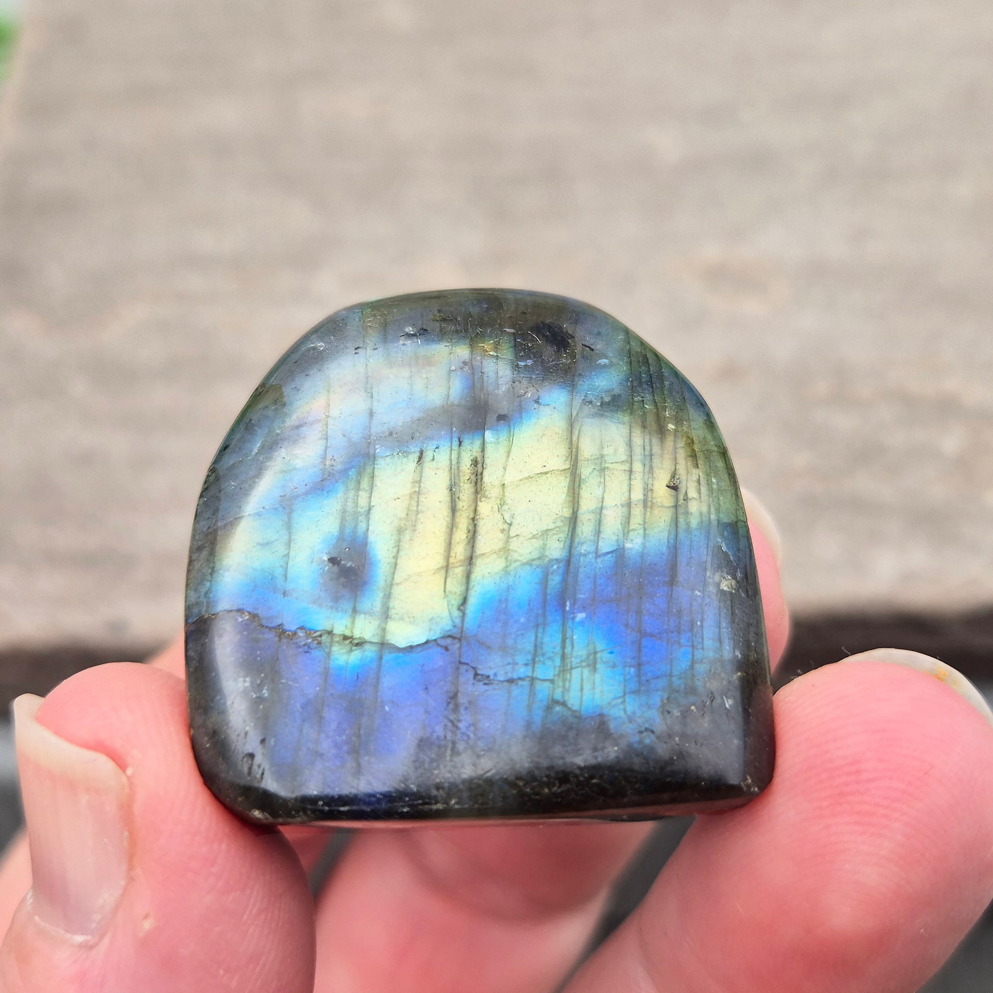 Labradorite Crystal Freeform. When the light hits it at just the right angle, flashes of yellow, and blue appear.