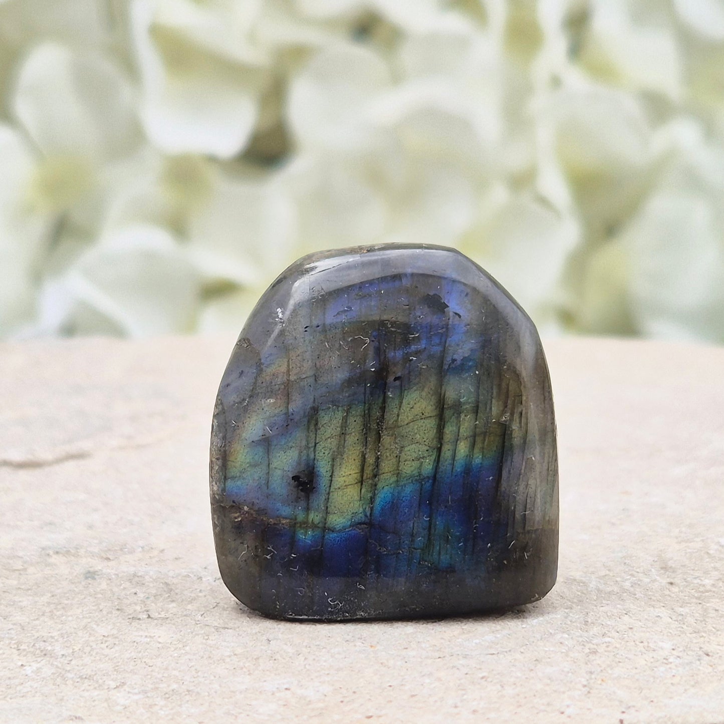 Labradorite Crystal Freeform. When the light hits it at just the right angle, flashes of yellow, and blue appear.
