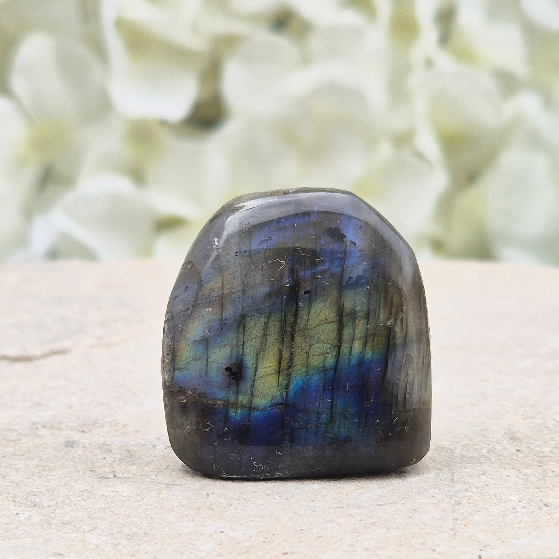 Labradorite Crystal Freeform. When the light hits it at just the right angle, flashes of yellow, and blue appear.