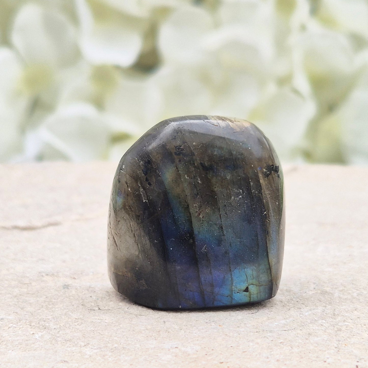 Labradorite Crystal Freeform. When the light hits it at just the right angle, flashes of yellow, and blue appear.