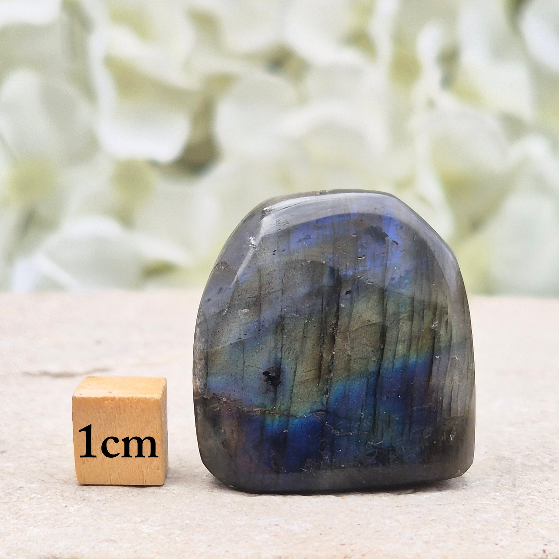 Labradorite Crystal Freeform with flashes of yellow, and blue. Labradorite is often chosen during times of change, reflection, or personal growth.