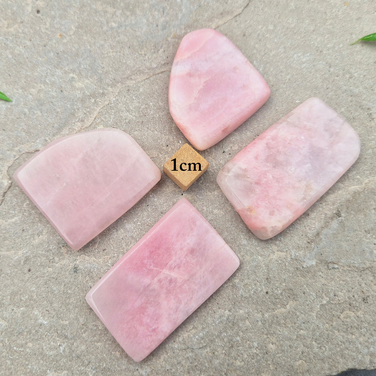 Pink Petalite polished slice with soft pale pink tones. Ideal for jewellery making, crystal grids, or carrying as a small calming stone.
