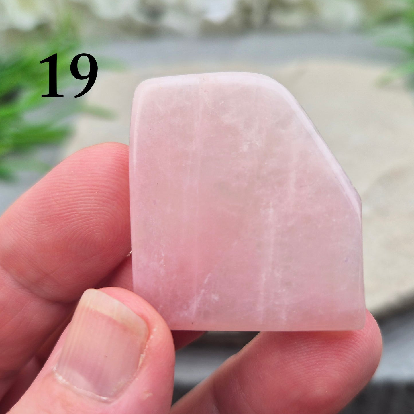 Pink Petalite polished slice with soft pale pink tones. Ideal for jewellery making, crystal grids, or carrying as a small calming stone.