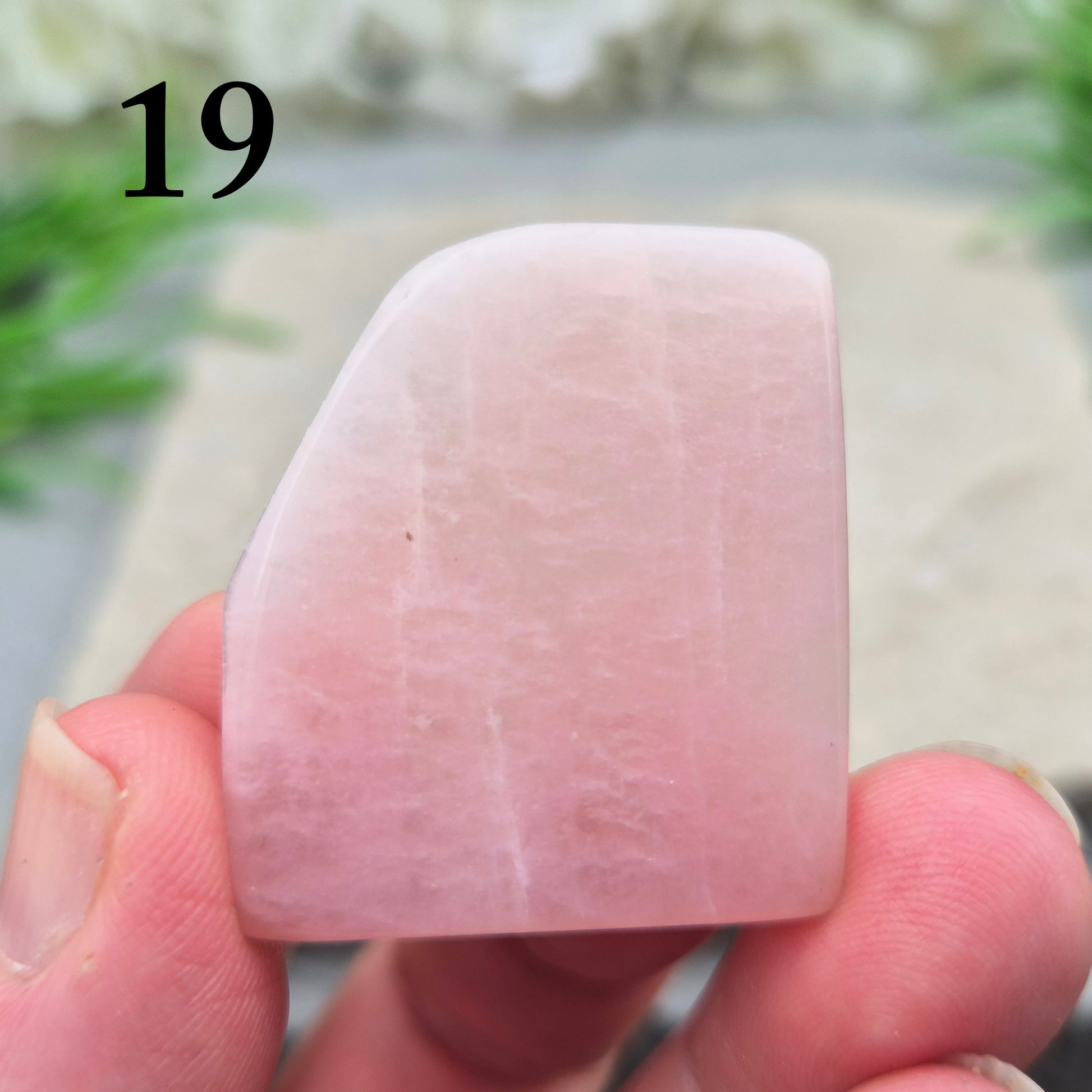 Pink Petalite polished slice with soft pale pink tones. Ideal for jewellery making, crystal grids, or carrying as a small calming stone.
