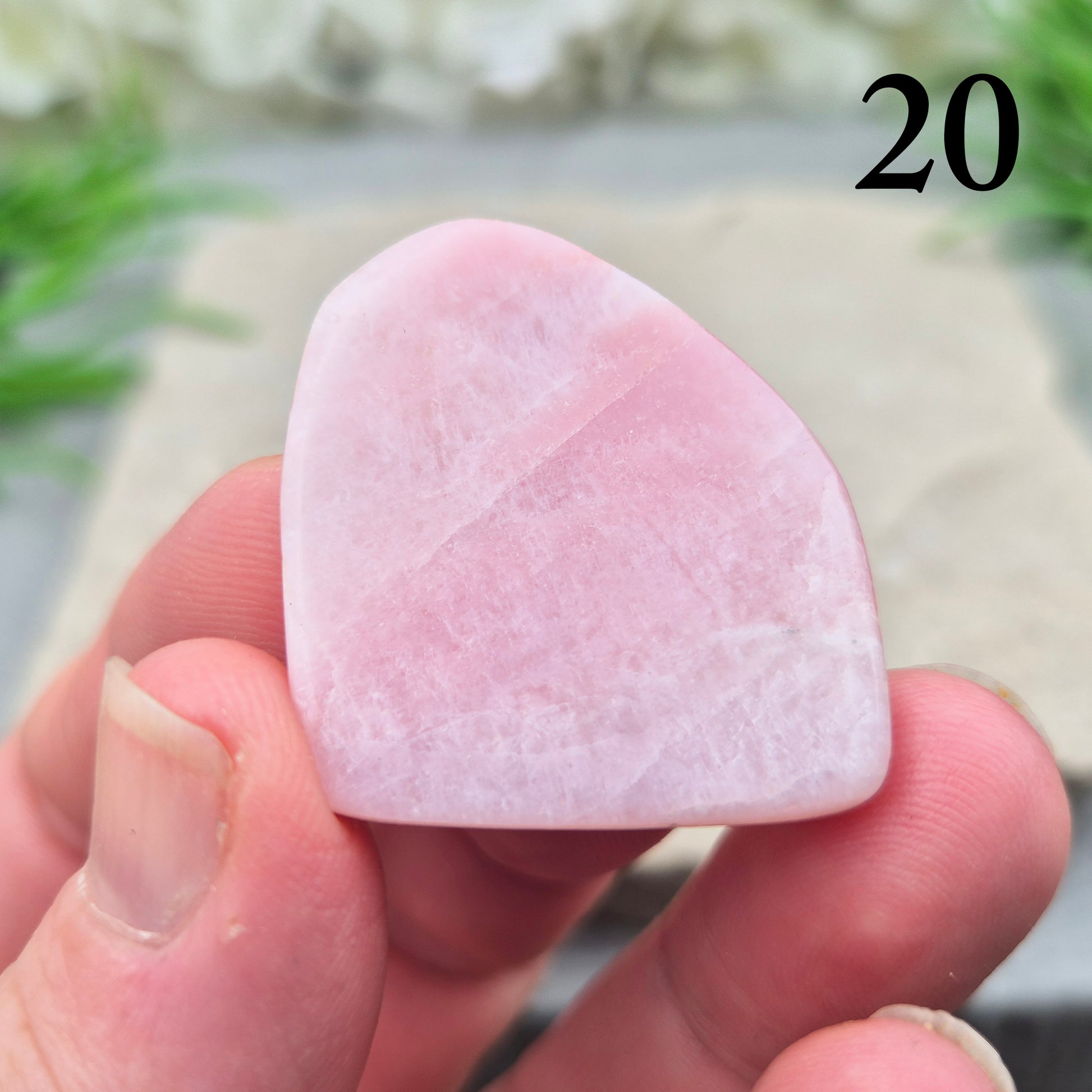 Pink Petalite polished slice with soft pale pink tones. Ideal for jewellery making, crystal grids, or carrying as a small calming stone.