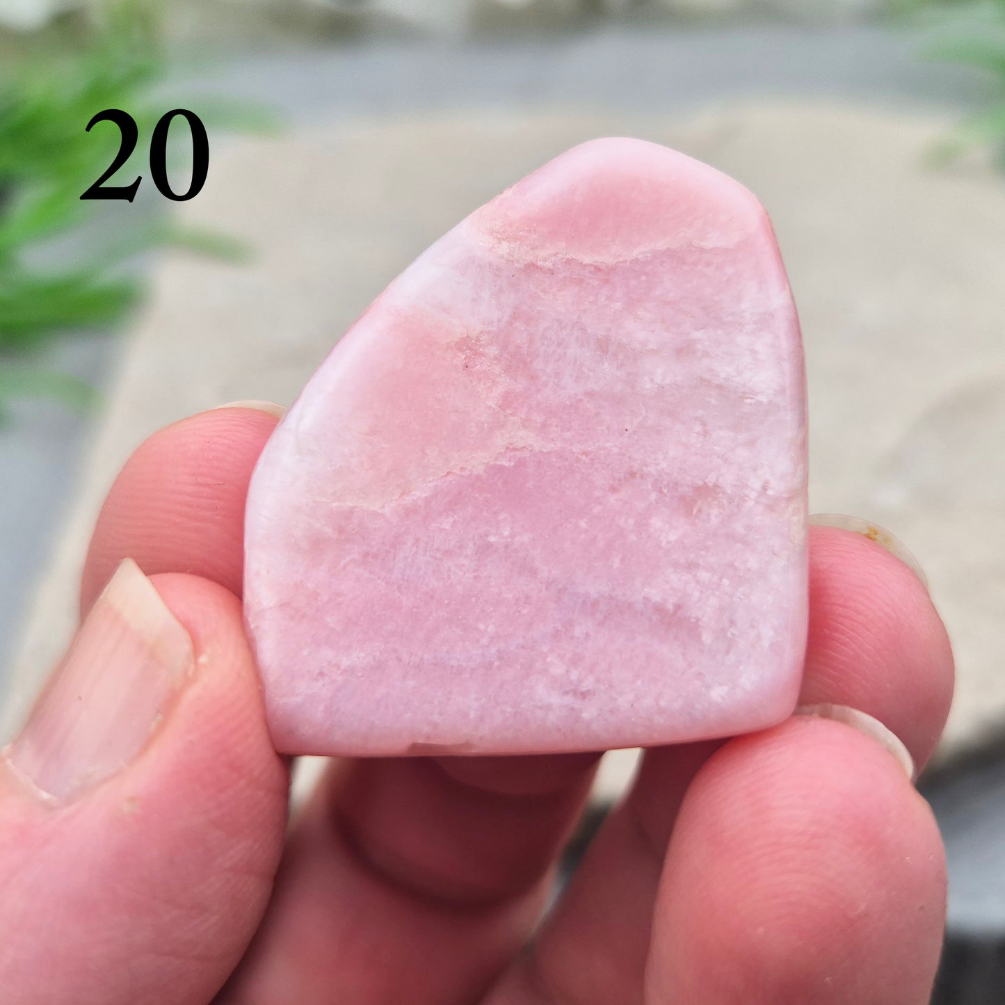 Pink Petalite polished slice with soft pale pink tones. Ideal for jewellery making, crystal grids, or carrying as a small calming stone.