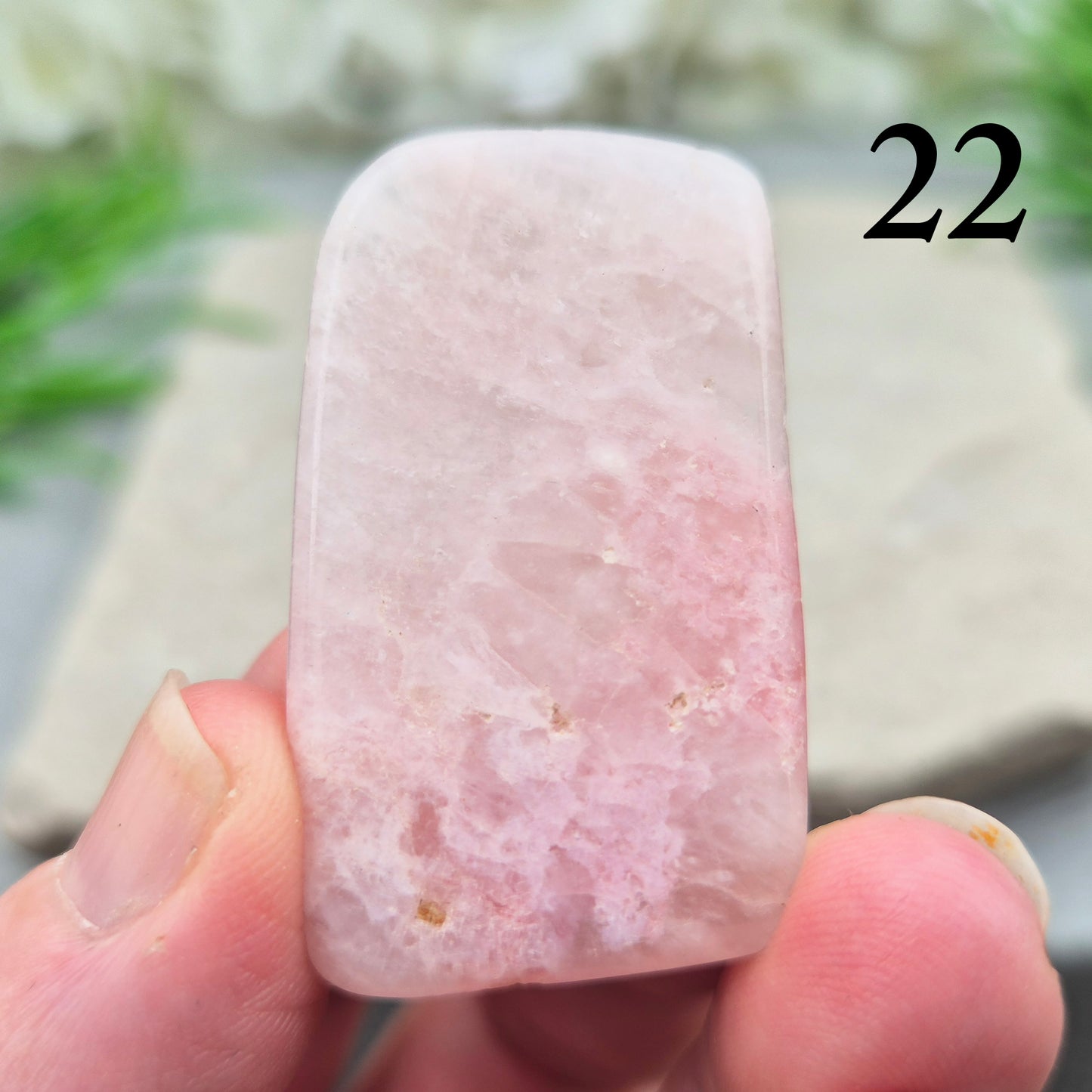 Pink Petalite polished slice with soft pale pink tones. Ideal for jewellery making, crystal grids, or carrying as a small calming stone.