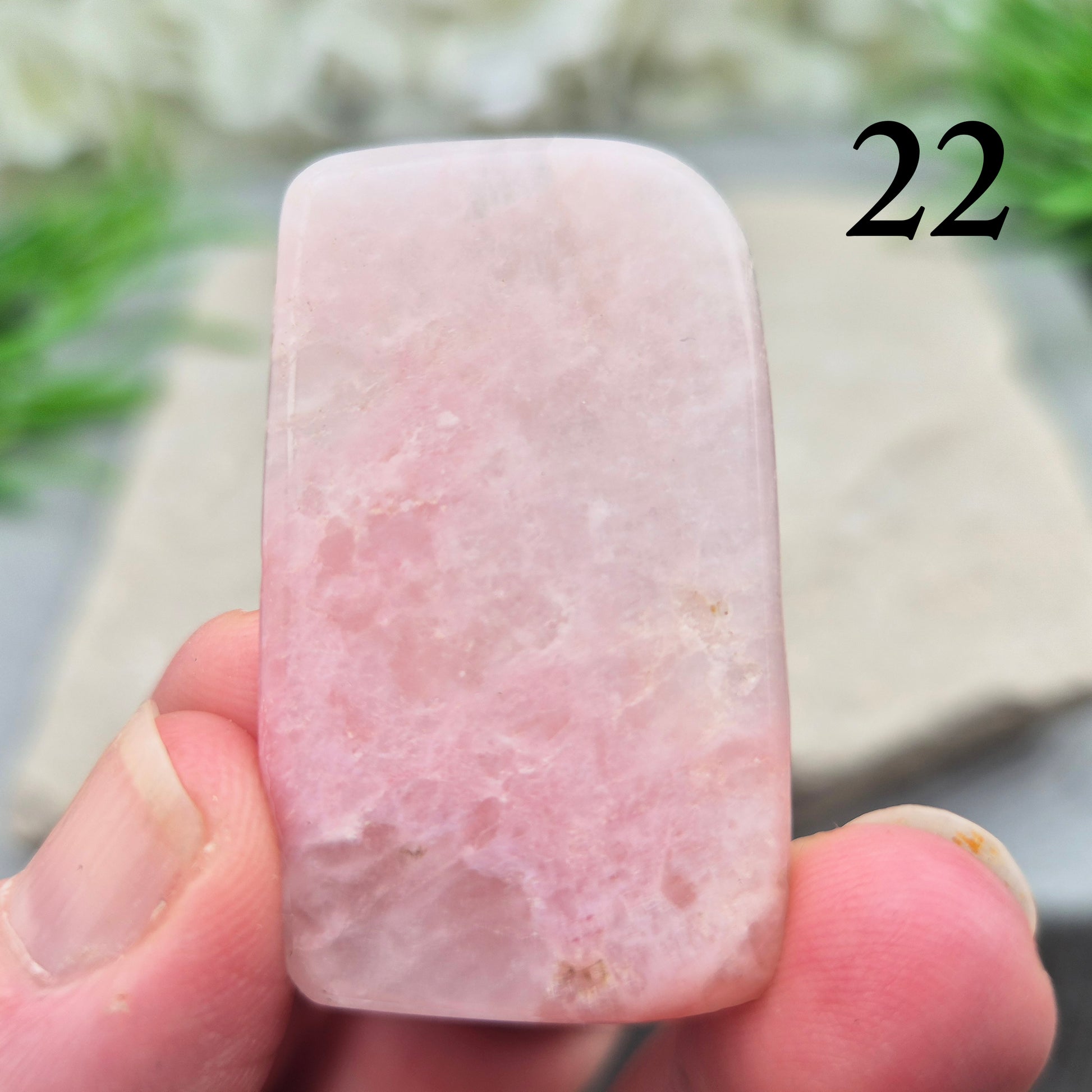 Pink Petalite polished slice with soft pale pink tones. Ideal for jewellery making, crystal grids, or carrying as a small calming stone.