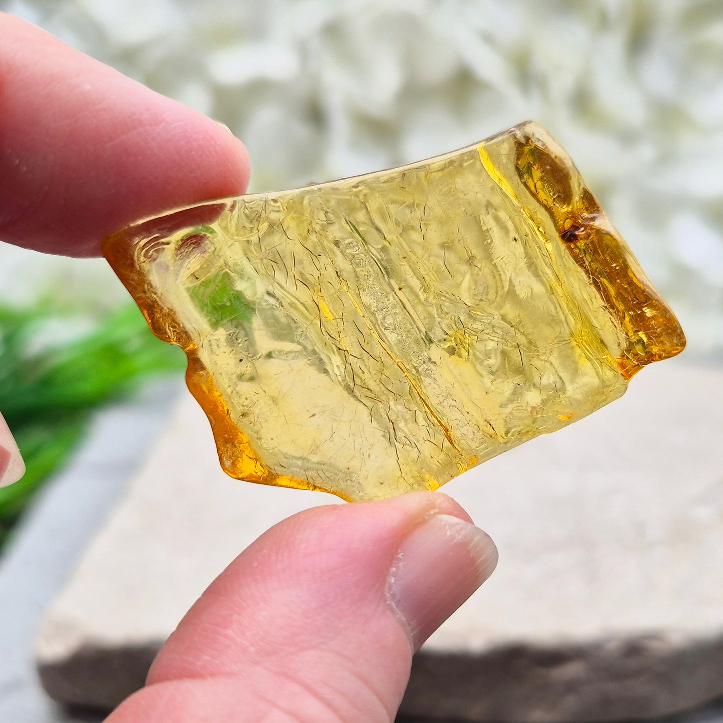 Natural Copal Amber from Colombia with warm golden tones. A lightweight, ancient tree resin ideal for calming spaces and adding gentle, uplifting energy.