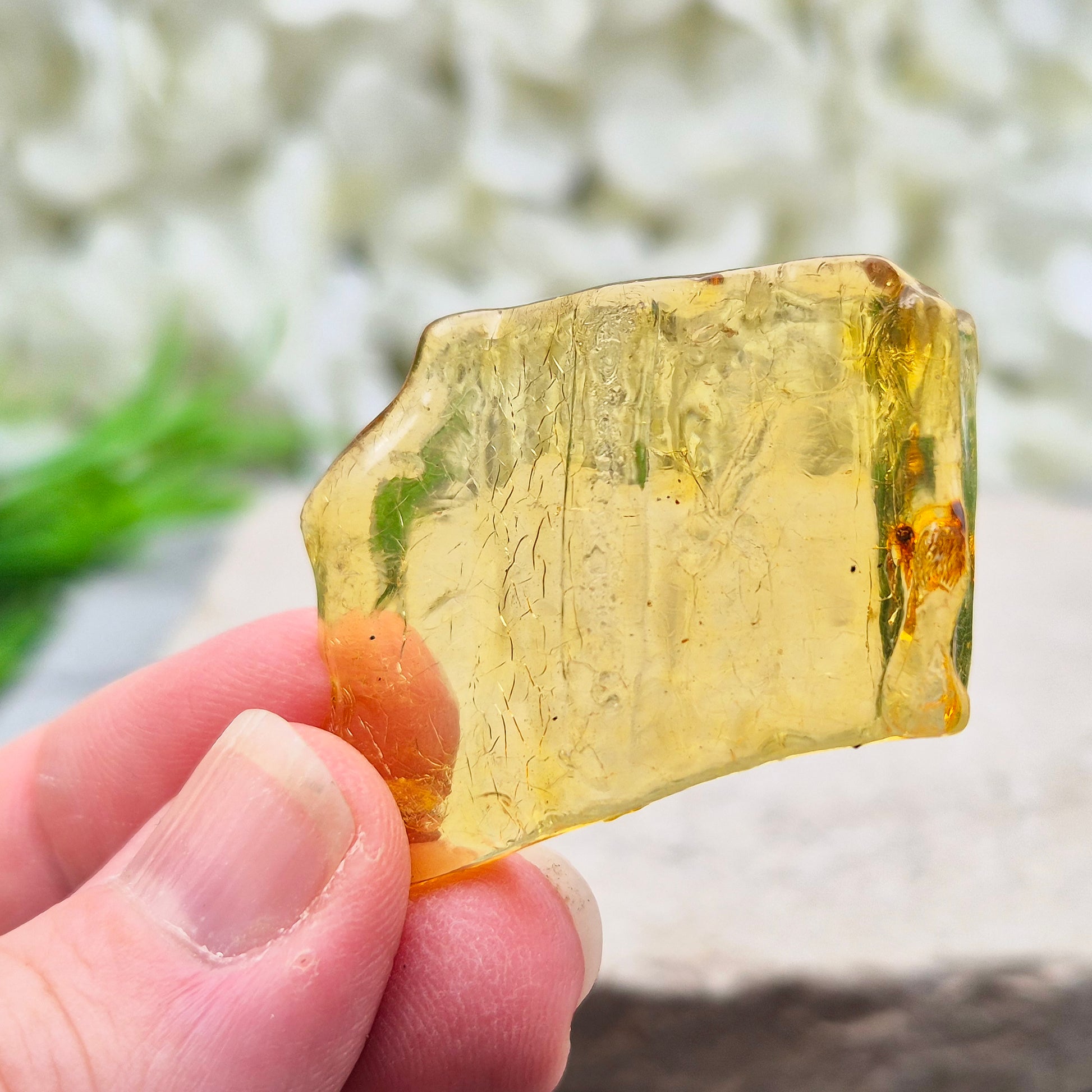 Natural Copal Amber from Colombia with warm golden tones. A lightweight, ancient tree resin ideal for calming spaces and adding gentle, uplifting energy.