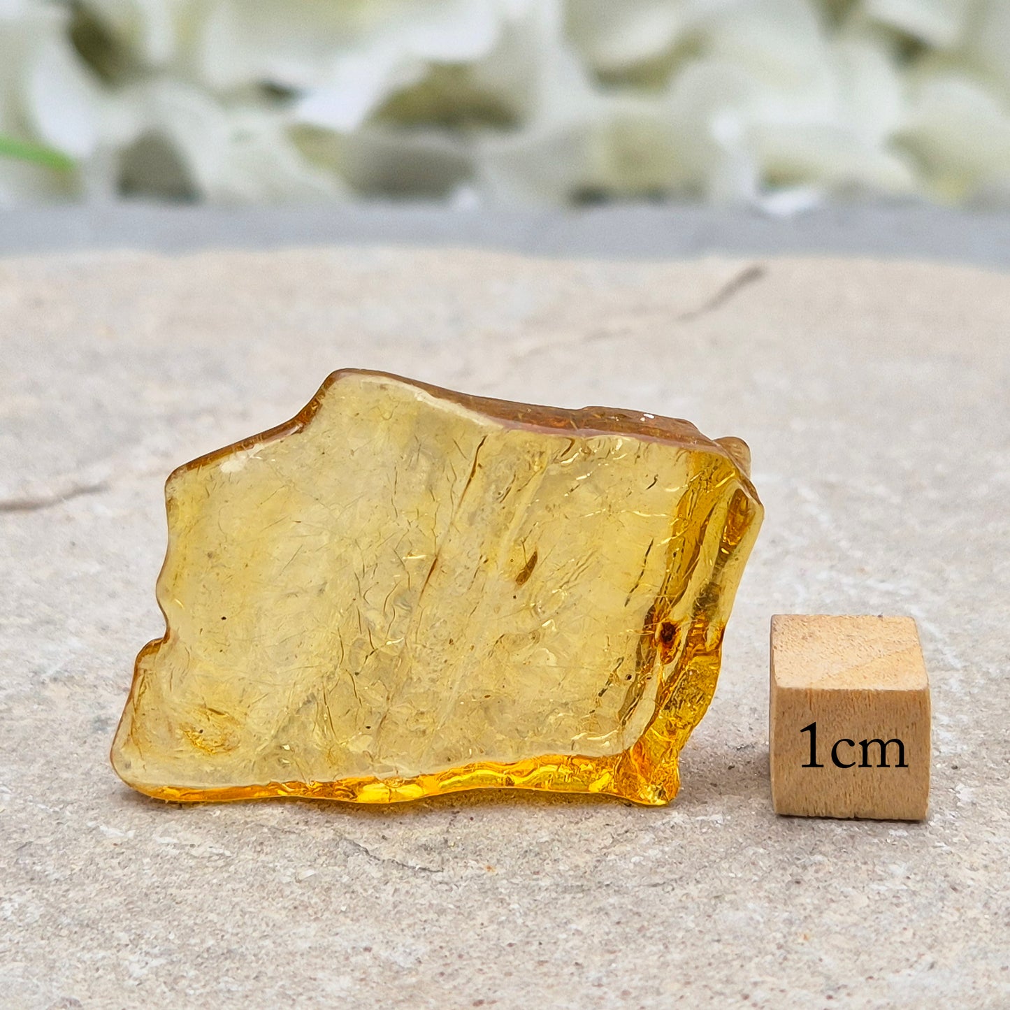Natural Copal Amber from Colombia with warm golden tones. A lightweight, ancient tree resin ideal for calming spaces and adding gentle, uplifting energy.
