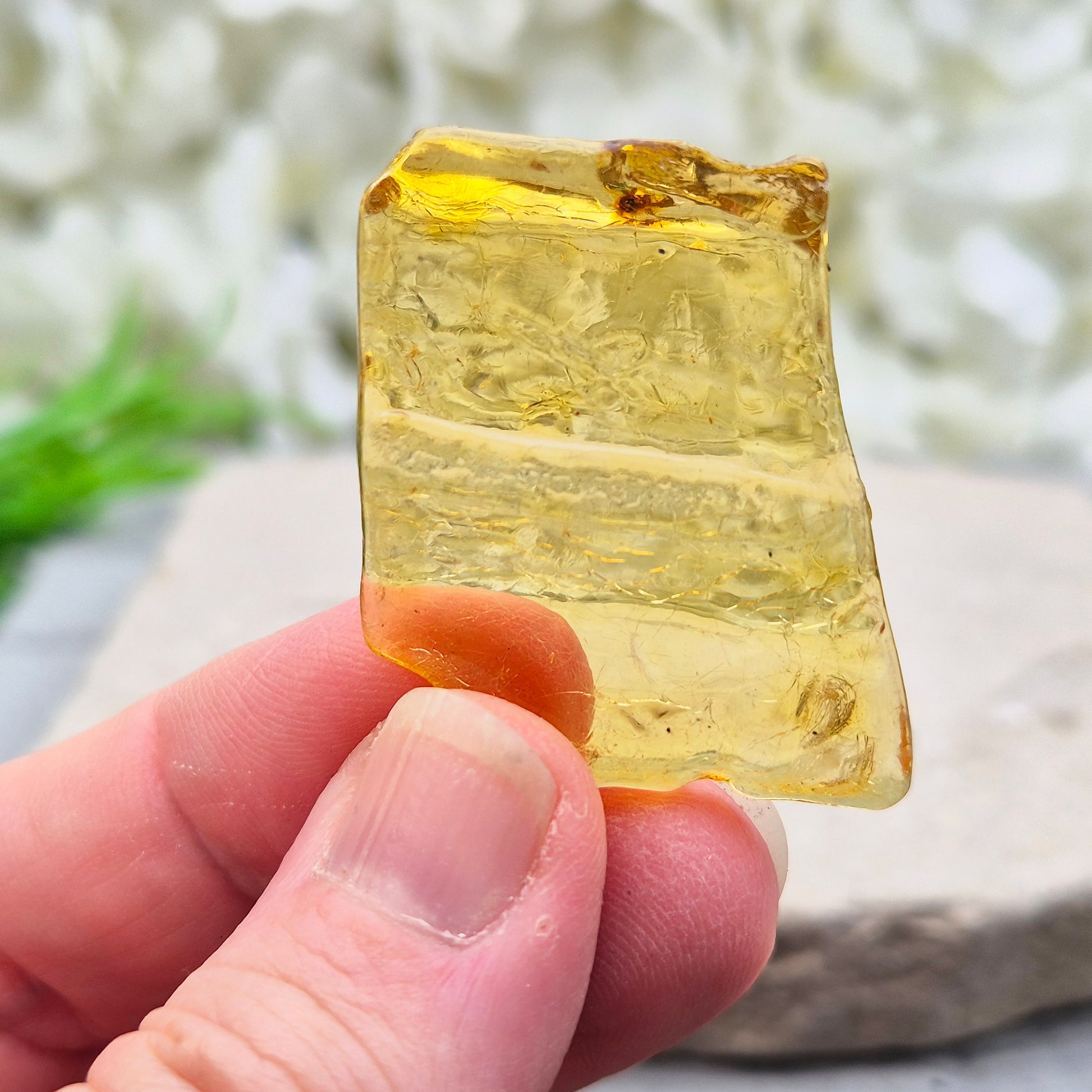 Natural Copal Amber from Colombia with warm golden tones. A lightweight, ancient tree resin ideal for calming spaces and adding gentle, uplifting energy.