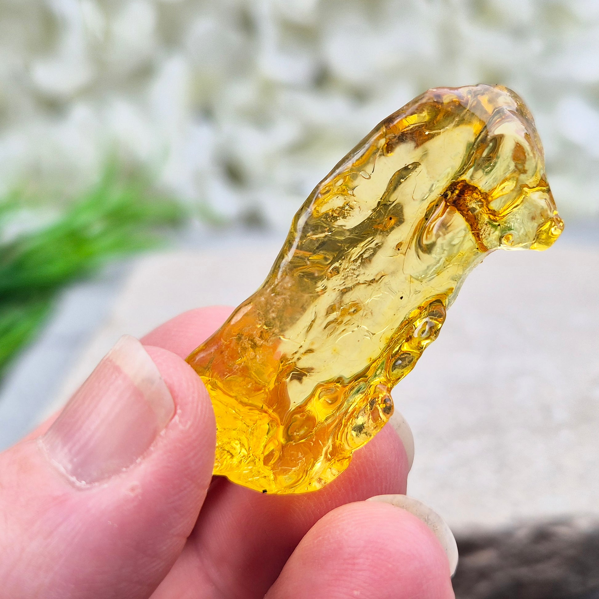 Natural Copal Amber resin with warm, uplifting energy. Traditionally used for cleansing, renewal, and positive flow. Lightweight, natural, and unique piece.