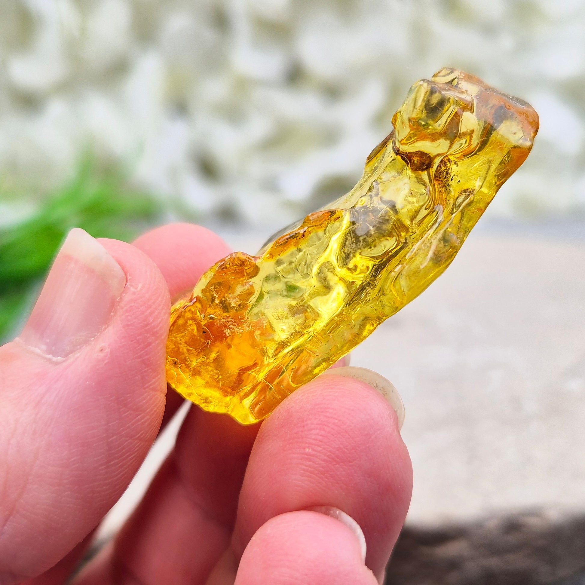 Natural Copal Amber resin with warm, uplifting energy. Traditionally used for cleansing, renewal, and positive flow. Lightweight, natural, and unique piece.