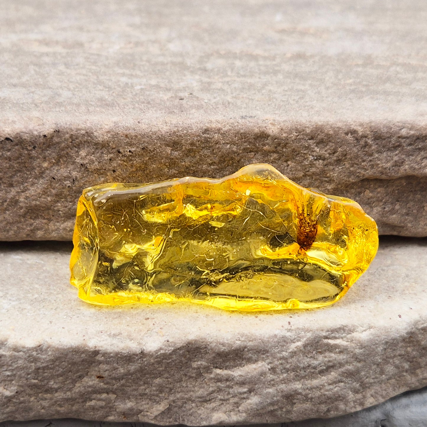 Natural Copal Amber resin with warm, uplifting energy. Traditionally used for cleansing, renewal, and positive flow. Lightweight, natural, and unique piece.