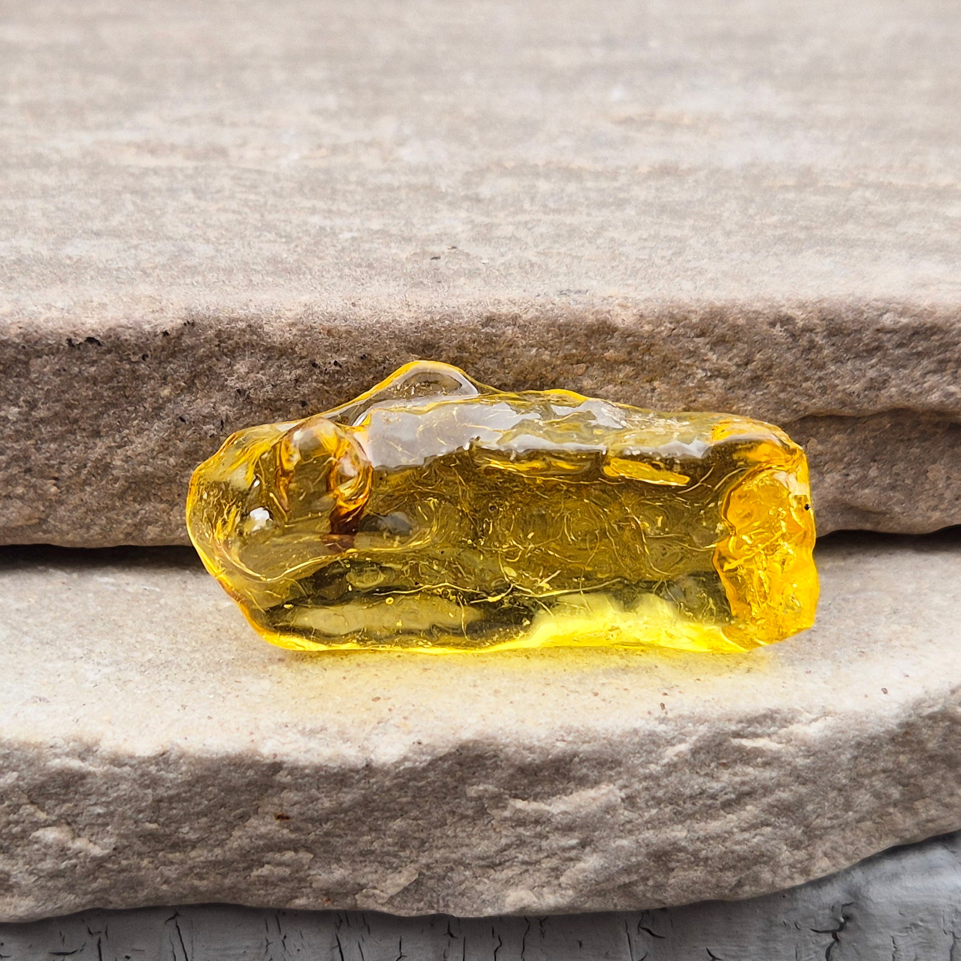 Natural Copal Amber resin with warm, uplifting energy. Traditionally used for cleansing, renewal, and positive flow. Lightweight, natural, and unique piece.