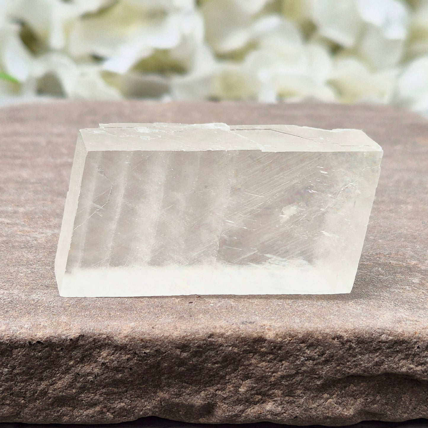 Natural Optical Calcite from Mexico natural rhomboid shape and off white colour. Often chosen for clarity, balance, and focused energy.