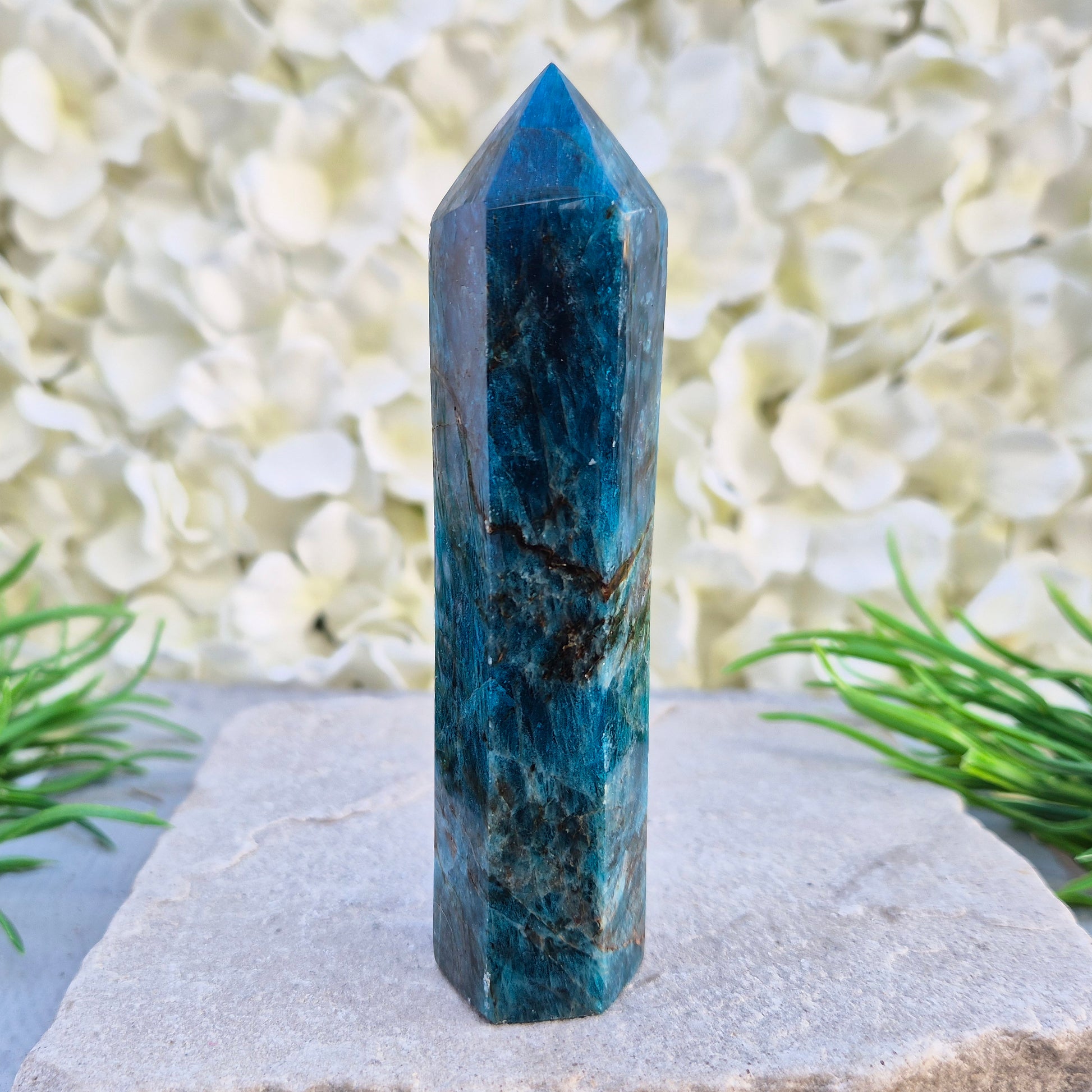 Blue Apatite polished generator point from Madagascar. Deep teal stone for focus, motivation, clear communication, and intuitive guidance.