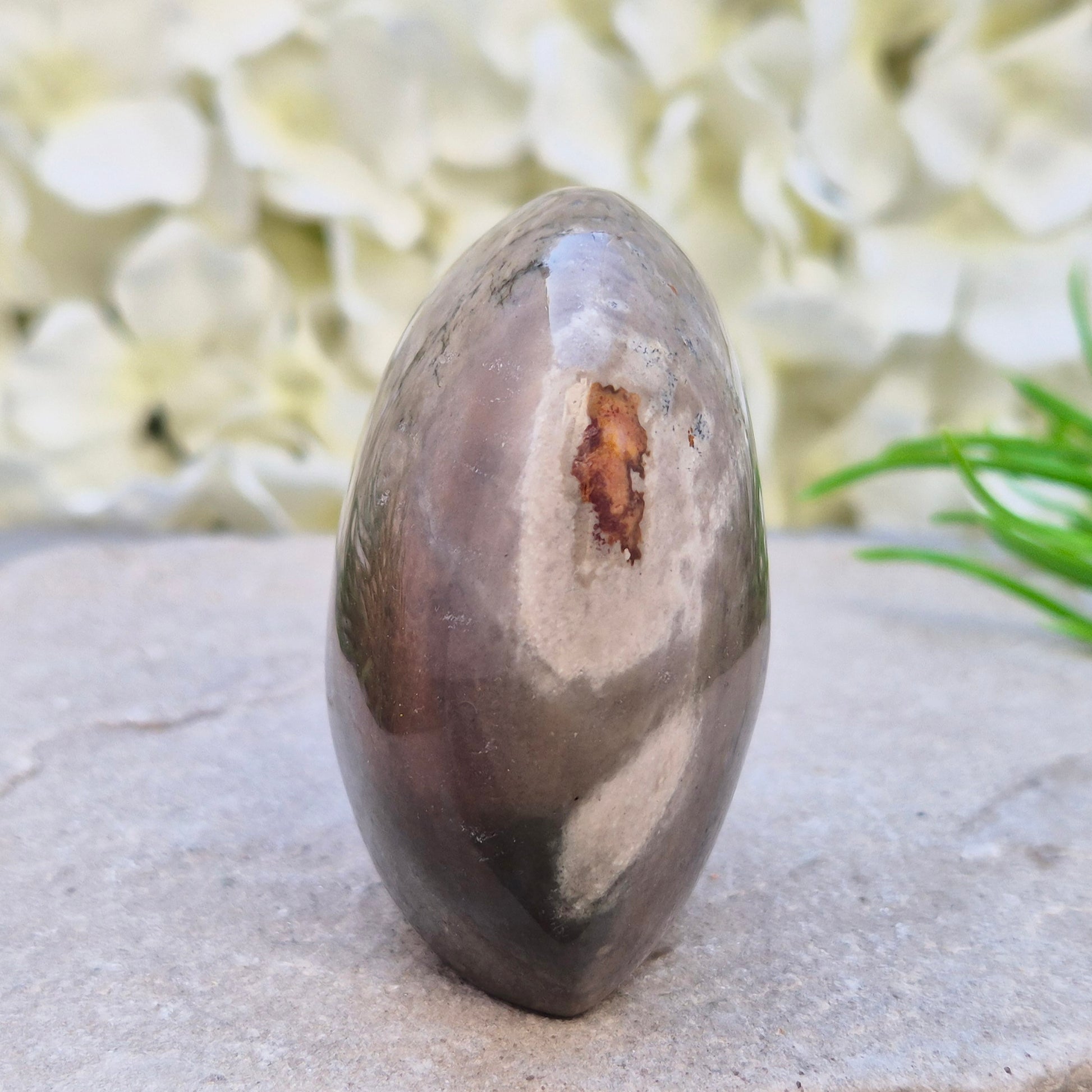 Polychrome Jasper freeform from Madagascar. Polished stone with earthy tones for grounding, stability, and balanced everyday energy.